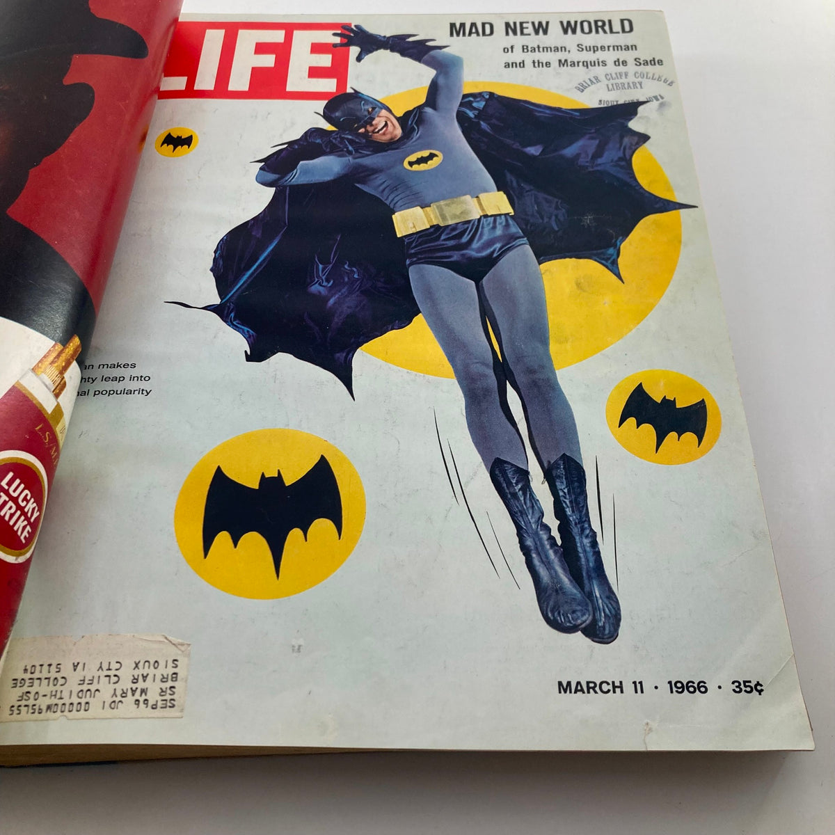 Vintage 1966 LIFE Magazine Bound Edition, March 11 issue cover highlighting Batman in a vibrant comic illustration.