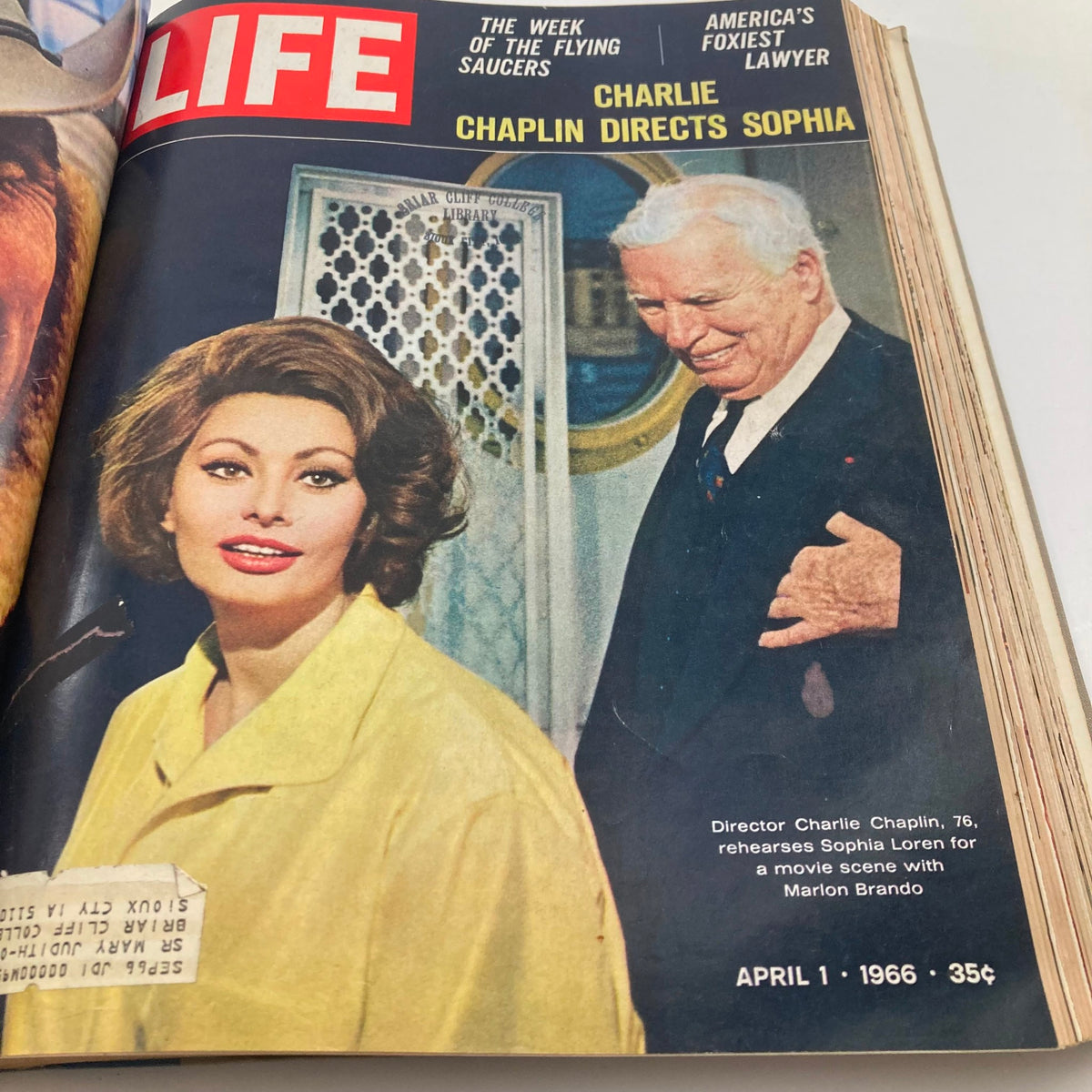 Cover of the VTG 1966 Bound Life Magazine featuring Charlie Chaplin directing Sophia Loren for a film scene, showcasing the artistic brilliance of the 1960s.