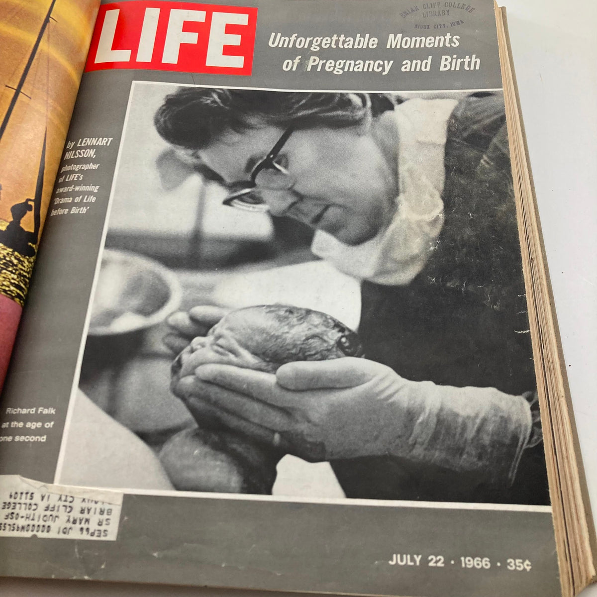 Cover of the July 22, 1966 issue of the VTG 1966 Bound Life Magazine featuring a nurse holding a newborn, focusing on moments of pregnancy and birth.