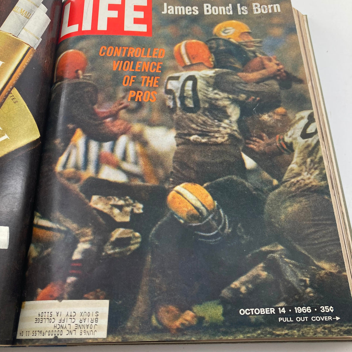 Inside page of VTG 1966 Bound Life Magazine featuring coverage of a sporting event, with a focus on the 'Controlled Violence of the Pros' theme.