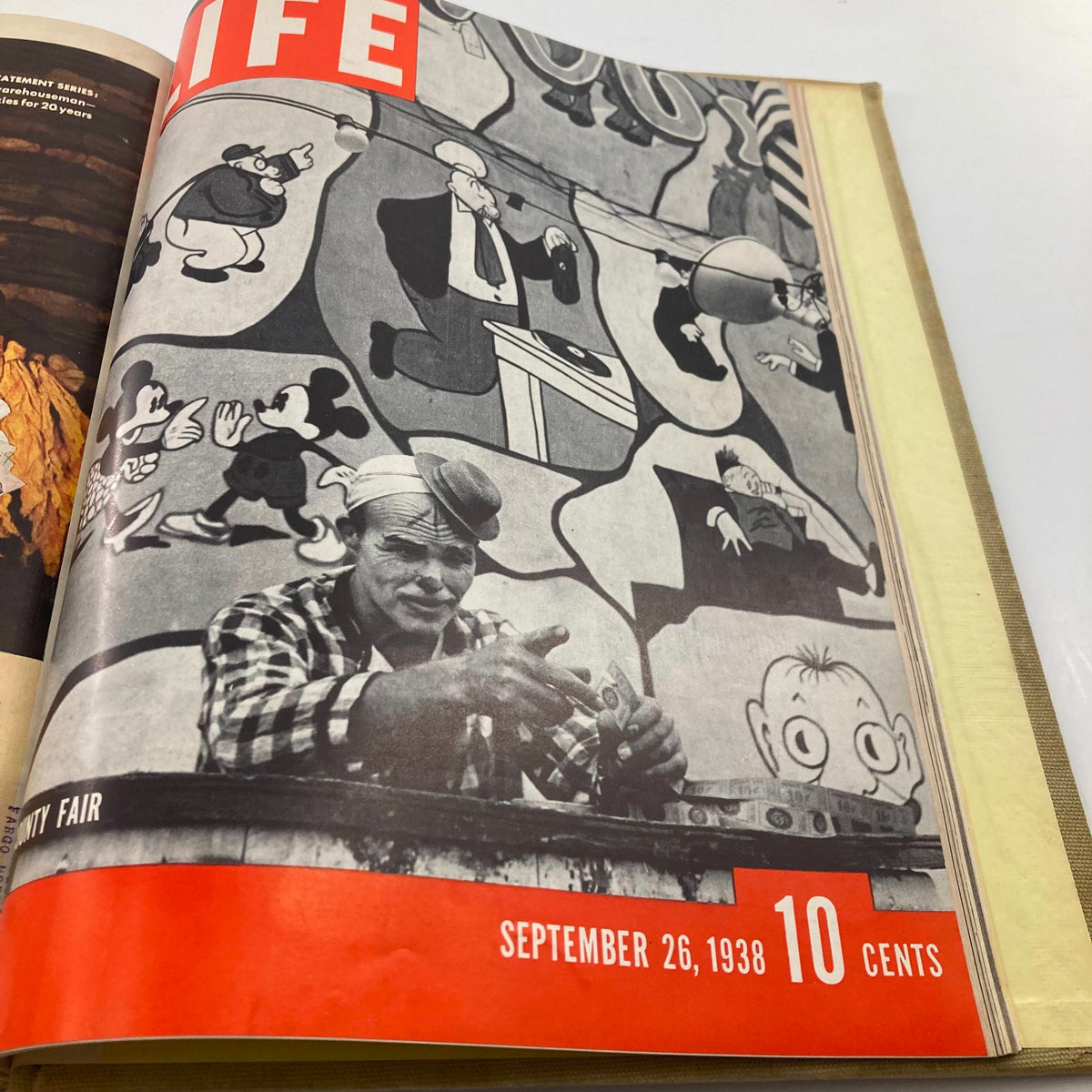 Cover of VTG 1938 Bound Life Magazine with a circus performer surrounded by cartoon characters, dated September 26, 1938, celebrating entertainment culture.
