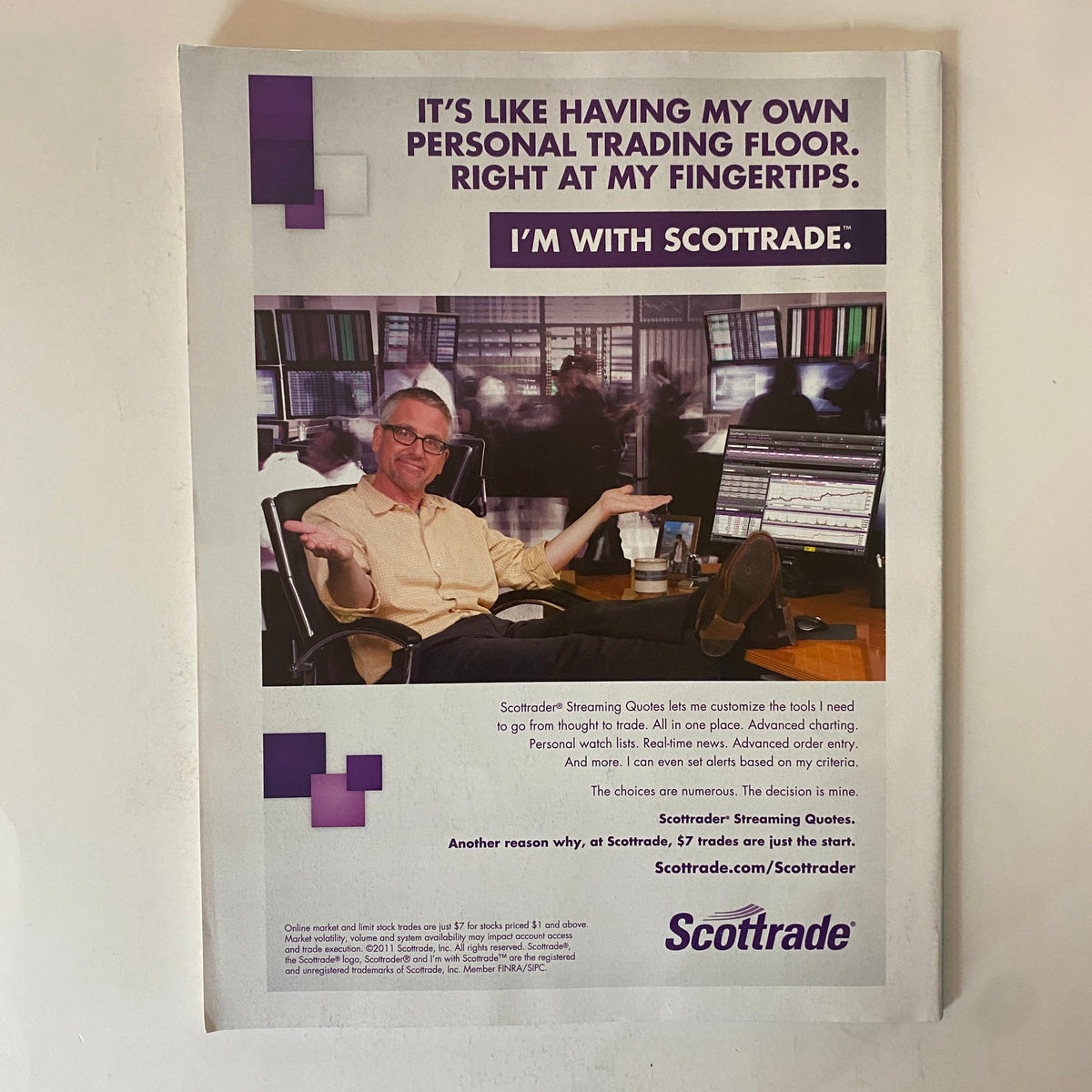 Back cover of Fortune Magazine July 2, 2012, featuring an advertisement for Scottrade with a person at a trading desk, emphasizing personal trading services.