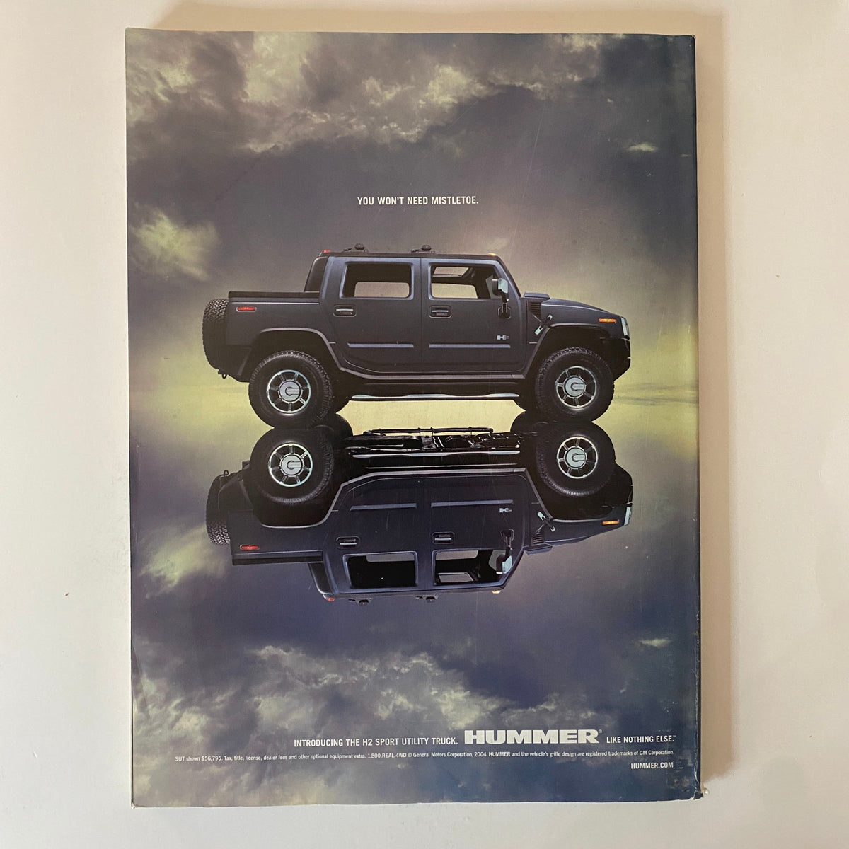 Back cover of Fortune Magazine December 13, 2004 featuring a Hummer promotional advertisement with the tagline 'YOU WON'T NEED MISTLETOE.' This issue highlights the early days of Google with founders Larry Page and Sergey Brin on the cover, making it a valuable collectible for technology and business history enthusiasts.