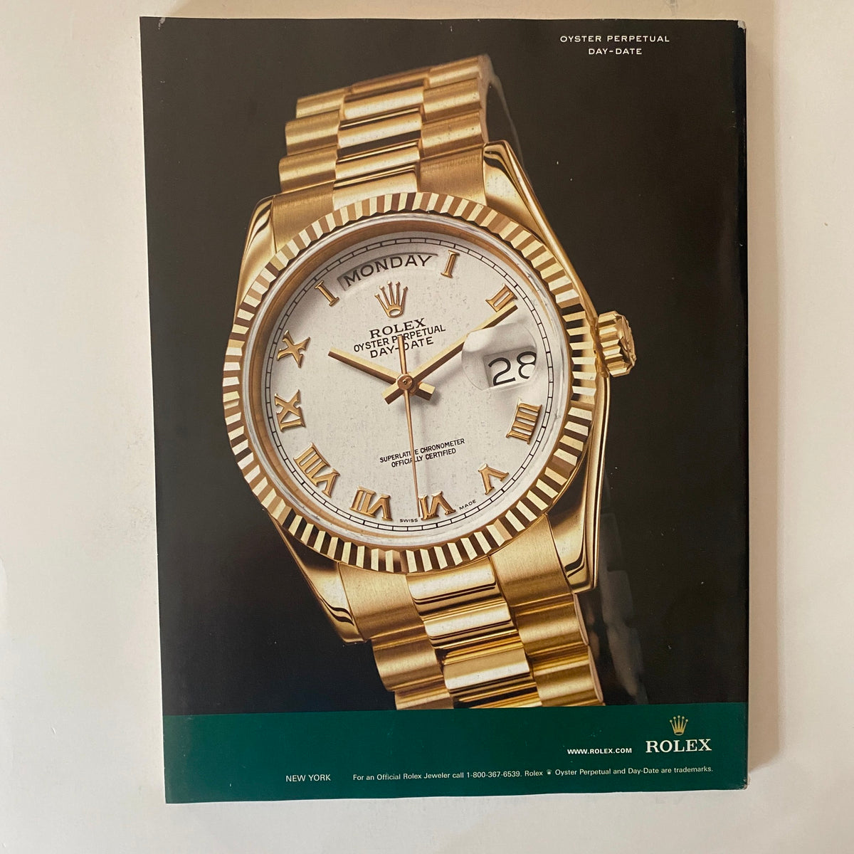 Fortune Magazine November 27, 2006 advertisement for Rolex Oyster Perpetual Day-Date watch, emphasizing luxury and sophistication.