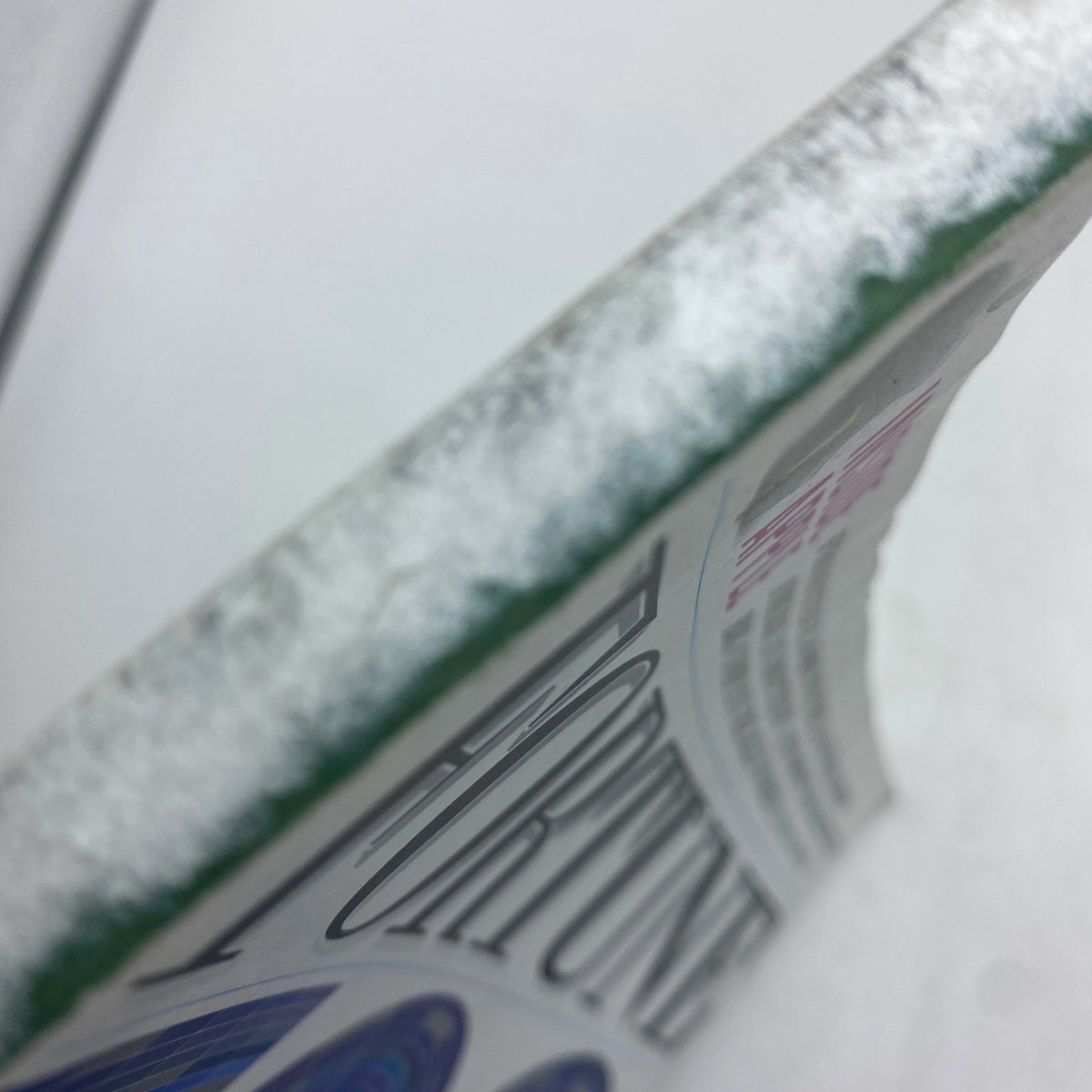 Side view of the Fortune Magazine May 23, 2011 Double Issue showing weathered edges, highlighting its vintage appeal and collectible nature.