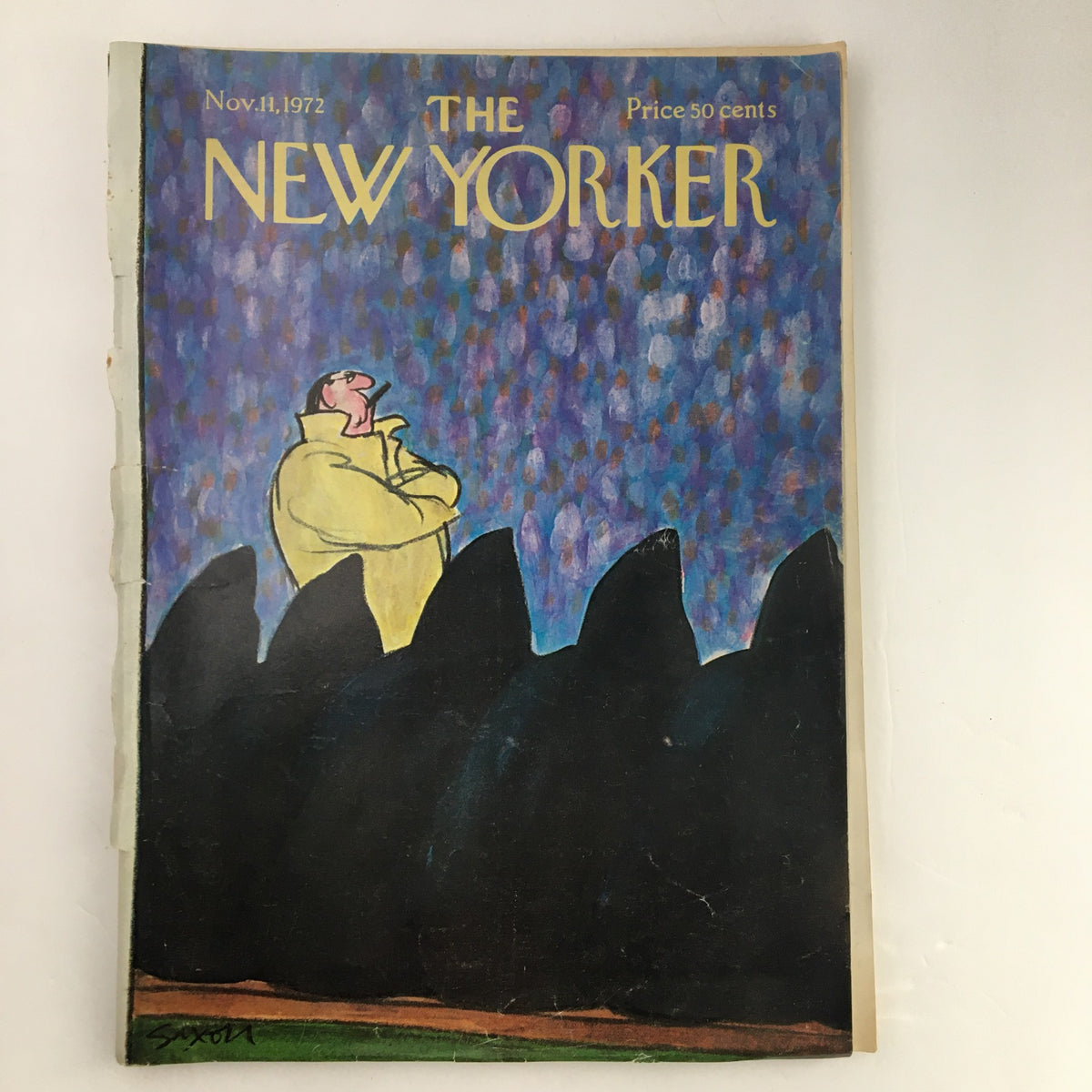 Cover of The New Yorker Magazine November 11 1972 featuring the illustration 'Man On a Hill' by Charles Saxon, depicting a figure in a yellow raincoat against a colorful background.