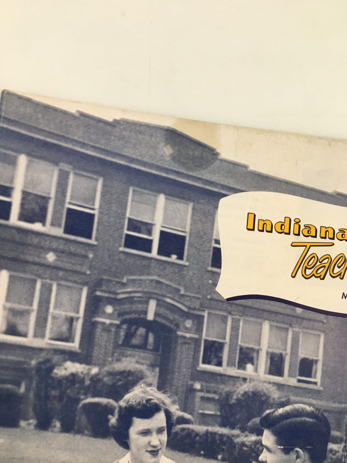 Close-up of the cover of VTG Indiana Teacher Magazine May 1955, highlighting the title and a backdrop of a historical school building.