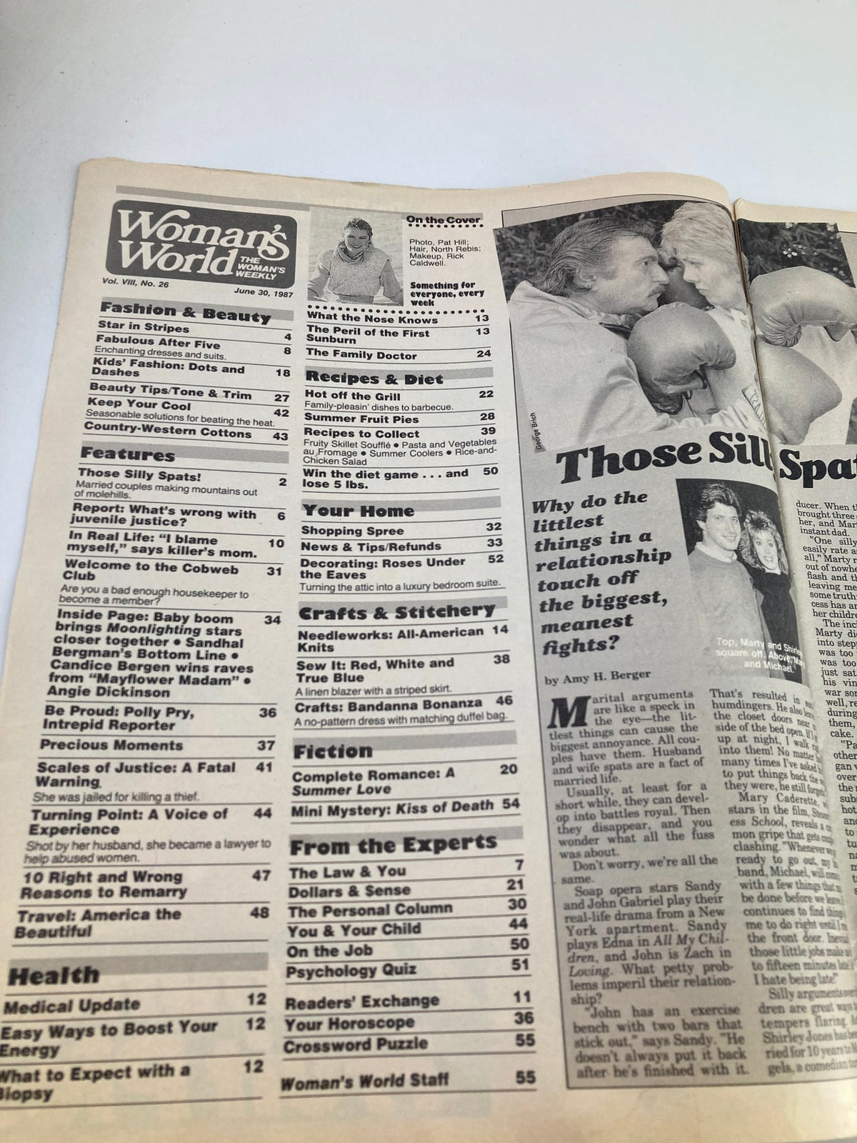 Woman's World Magazine June 30 1987 featuring an article layout with contents on knitting, recipes, and health tips. The magazine displays a section on All-American Sweaters to Knit and includes advertisements and column titles.