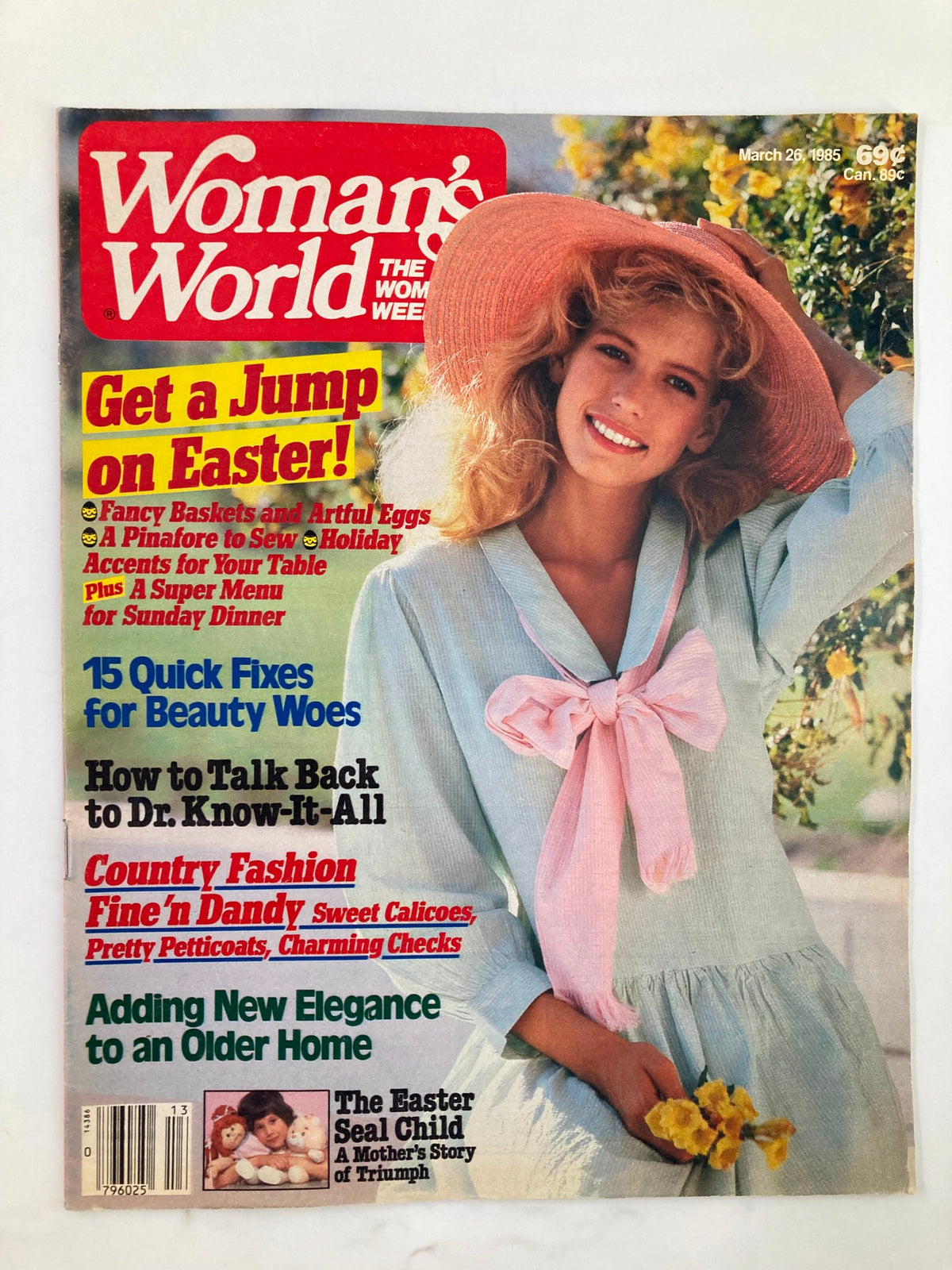 Cover of Woman's World Magazine dated March 26, 1985, featuring a woman in a stylish hat and light blue dress holding flowers. The issue includes articles on Easter preparations and a feature on the Easter Seal Child.