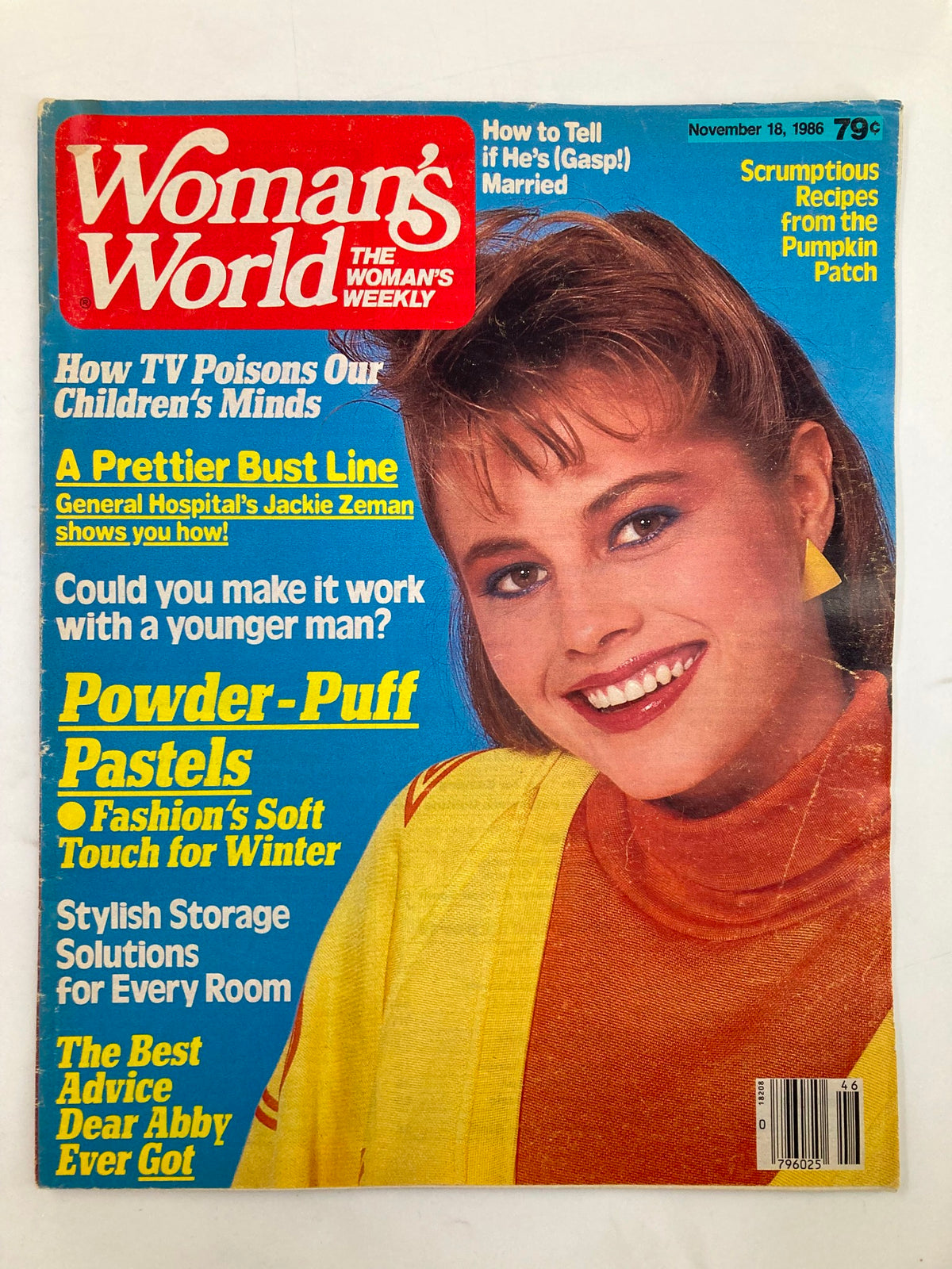 Cover of Woman's World Magazine, November 18, 1986, featuring the title 'Powder-Puff Pastels'. The magazine includes articles about fashion tips, mental health, and cooking, with a smiling woman on the cover wearing colorful attire.