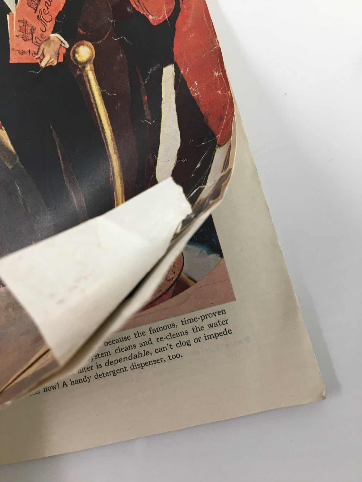 Close-up of the back cover of The Saturday Evening Post February 28 1959, displaying a partially torn edge, emphasizing the vintage condition.