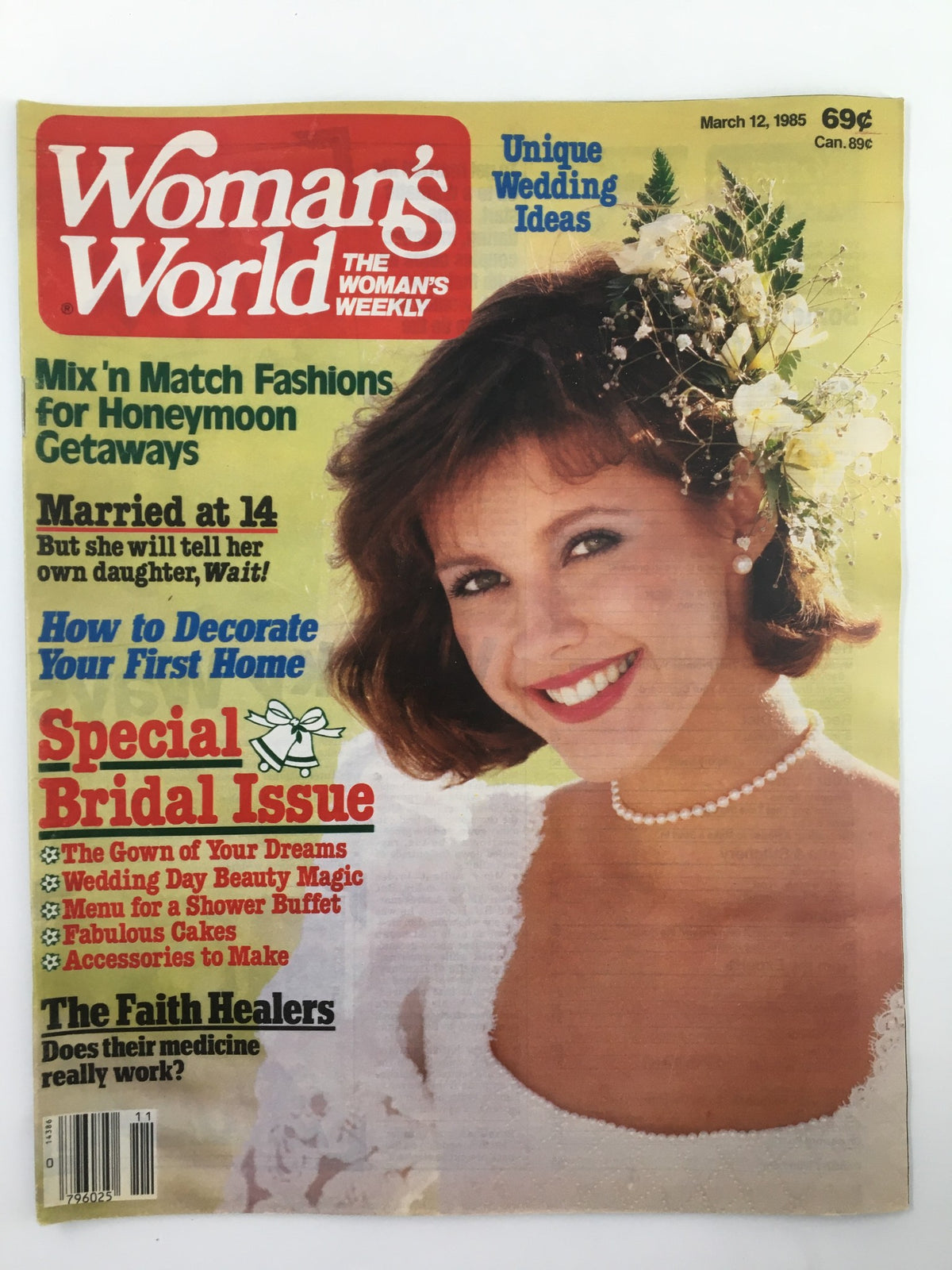 Woman's World Magazine March 12 1985 featuring an image of a smiling woman wearing a wedding dress and pearls, showcasing the bridal theme and key articles such as 'Mix 'n Match Fashions for Honeymoon Getaways' and 'The Faith Healers'.