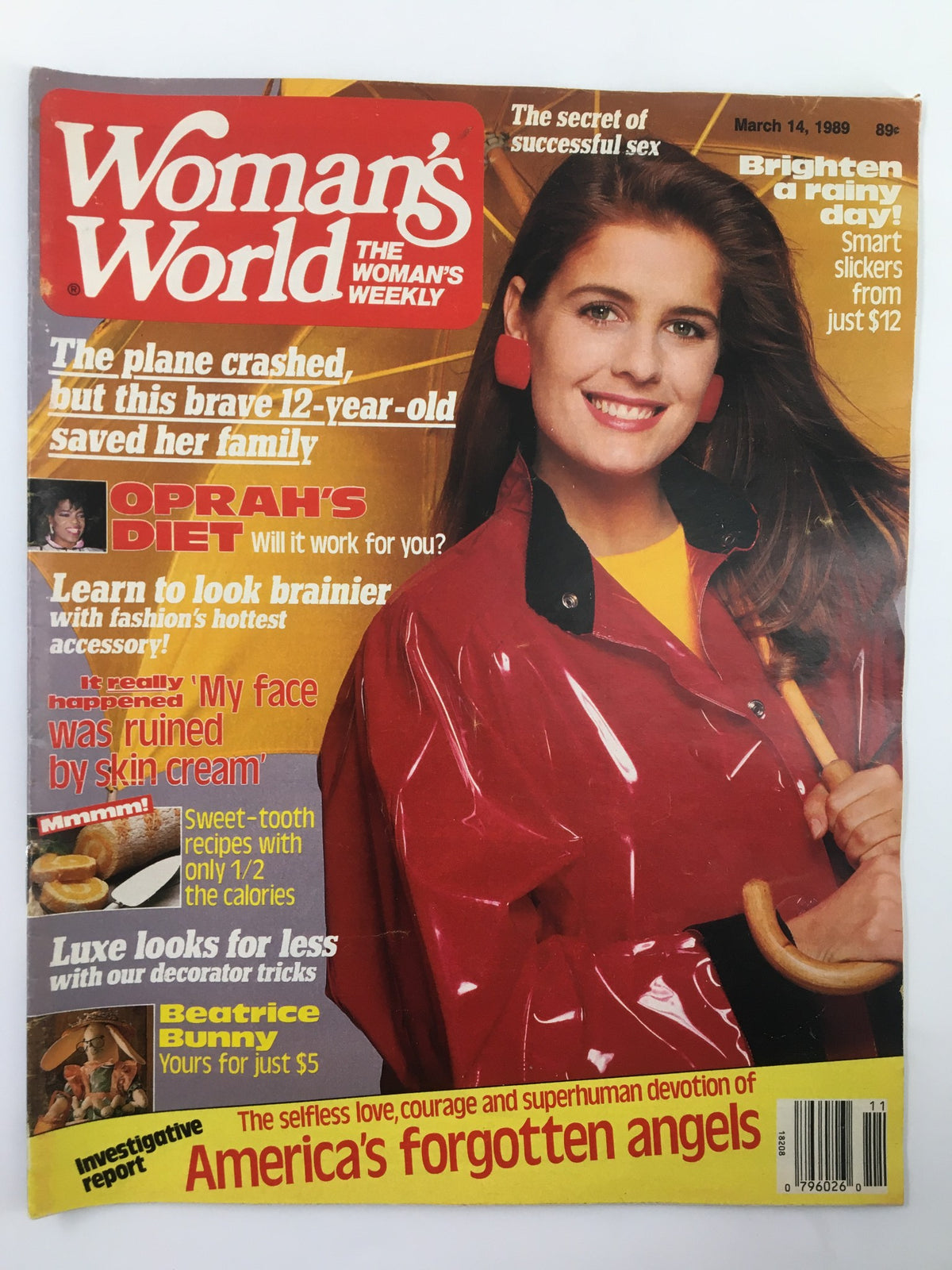 Cover of Woman's World Magazine March 14, 1989 featuring an article on Oprah's Diet, with a smiling woman in a red raincoat. Includes headlines about a heroic child and other features.