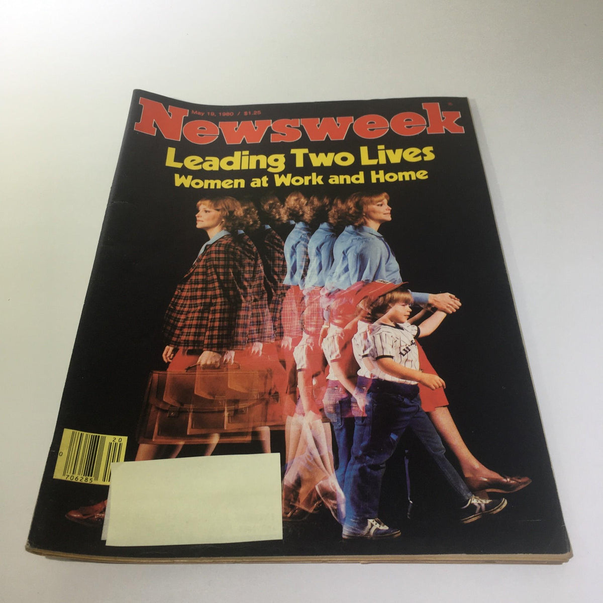 Cover of Newsweek Magazine from May 19, 1980, featuring the title 'Leading Two Lives: Women at Work and Home.' The cover showcases a woman in a plaid suit and a boy walking, highlighting the theme of balancing professional and domestic responsibilities.