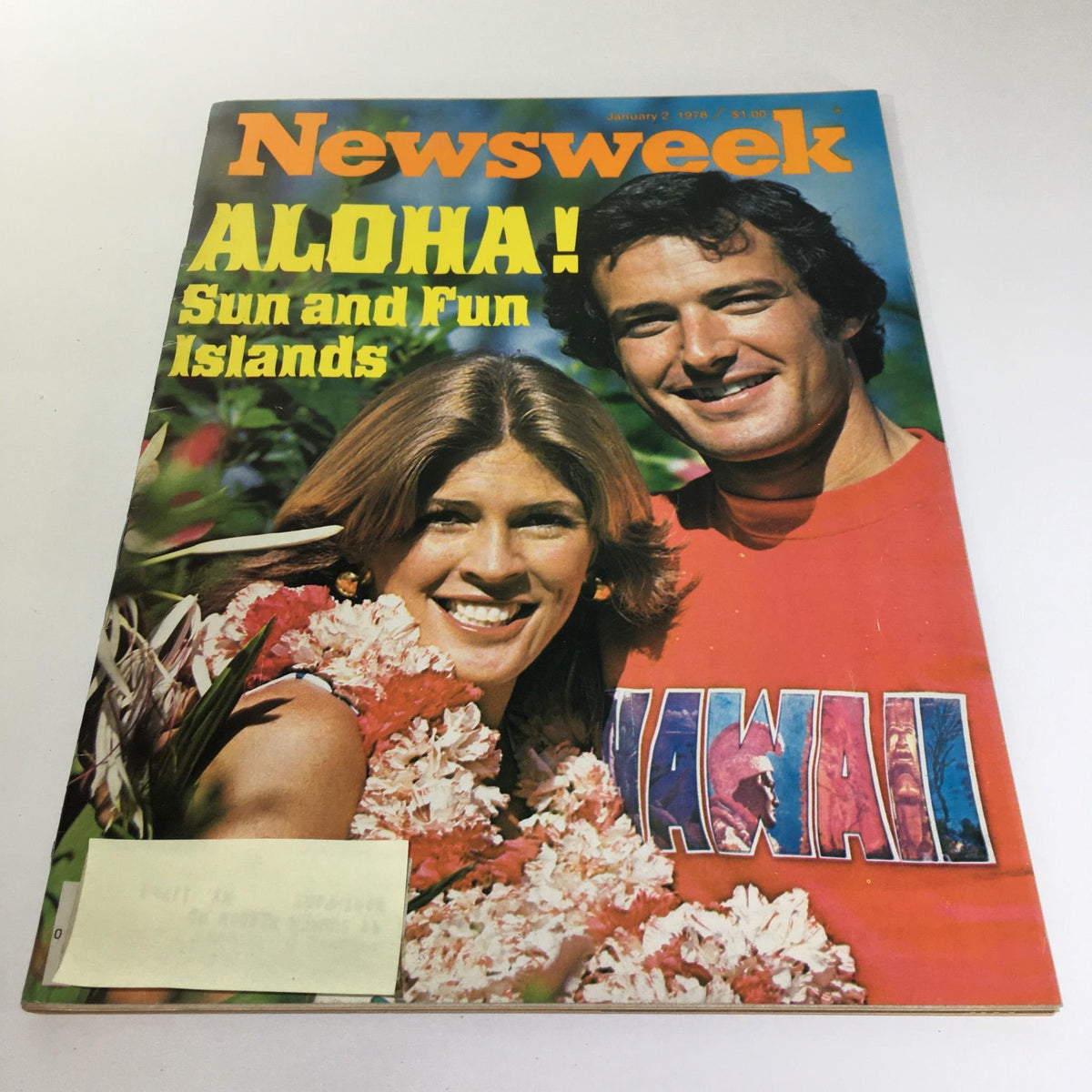 Cover of Newsweek Magazine from January 2, 1978, titled 'Aloha! Sun And Fun Islands', featuring a smiling couple surrounded by tropical flowers, showcasing Hawaii's vibrant culture and allure.