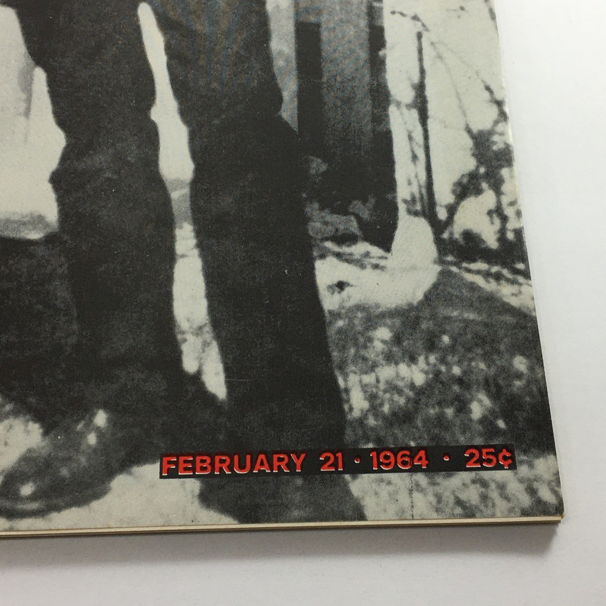 Close-up view of the bottom section of the cover of the VTG Life Magazine from February 21, 1964, showcasing the date 'FEBRUARY 21 1964' and the price '25¢'.