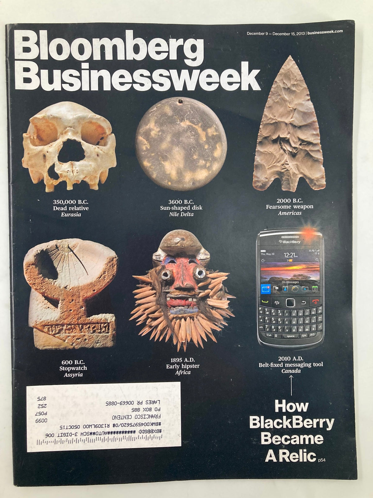 Bloomberg Businessweek Magazine cover from December 9, 2013, featuring the title 'How Blackberry Became A Relic,' showcasing images of historical artifacts and a Blackberry smartphone, illustrating the tech industry's evolution.