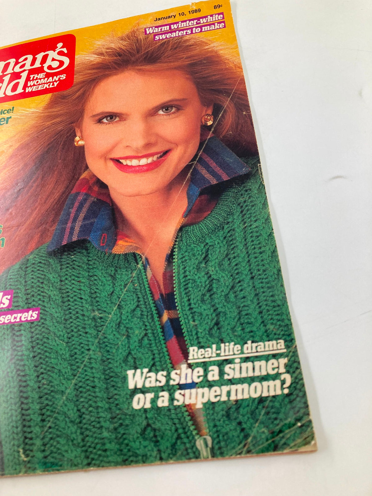 Close-up of Woman's World Magazine January 10, 1989 cover showing a woman in a green sweater, emphasizing topics like super-smart kids and real-life drama.
