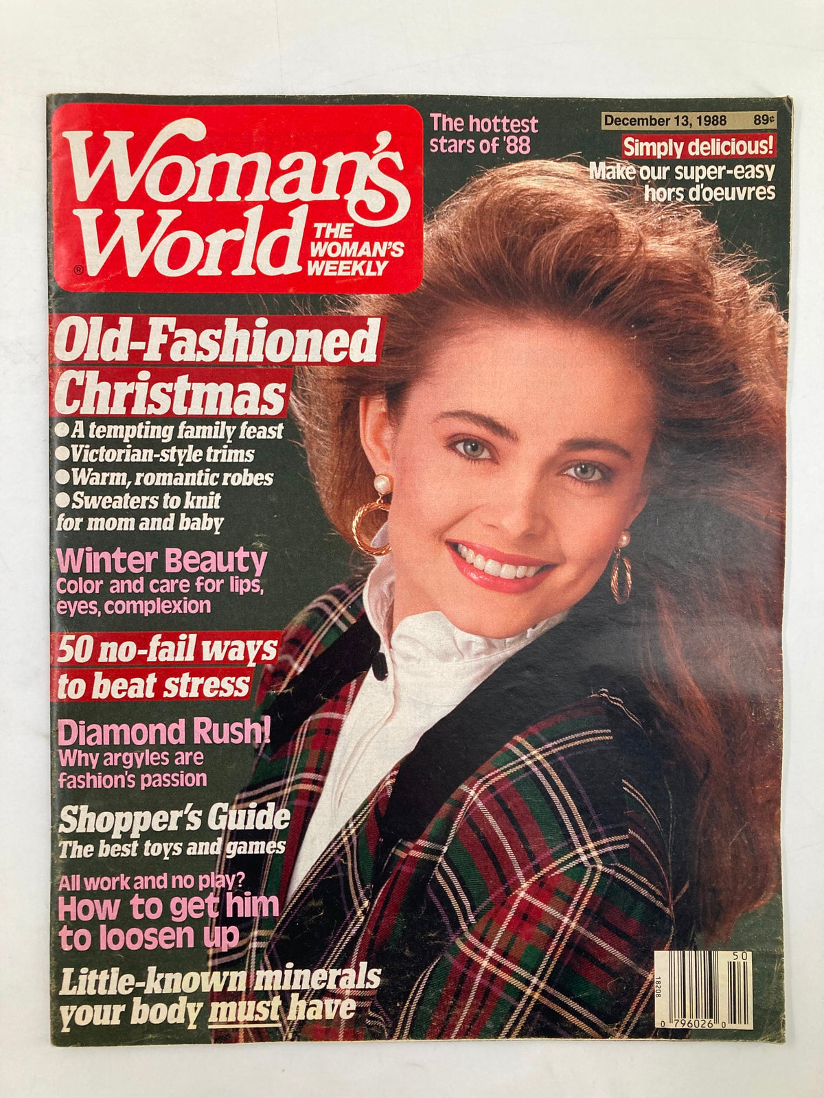 Cover of Woman's World Magazine December 13 1988 featuring an Old-Fashioned Christmas theme with a smiling woman in a plaid outfit, showcasing articles on family traditions, beauty tips, and holiday recipes.