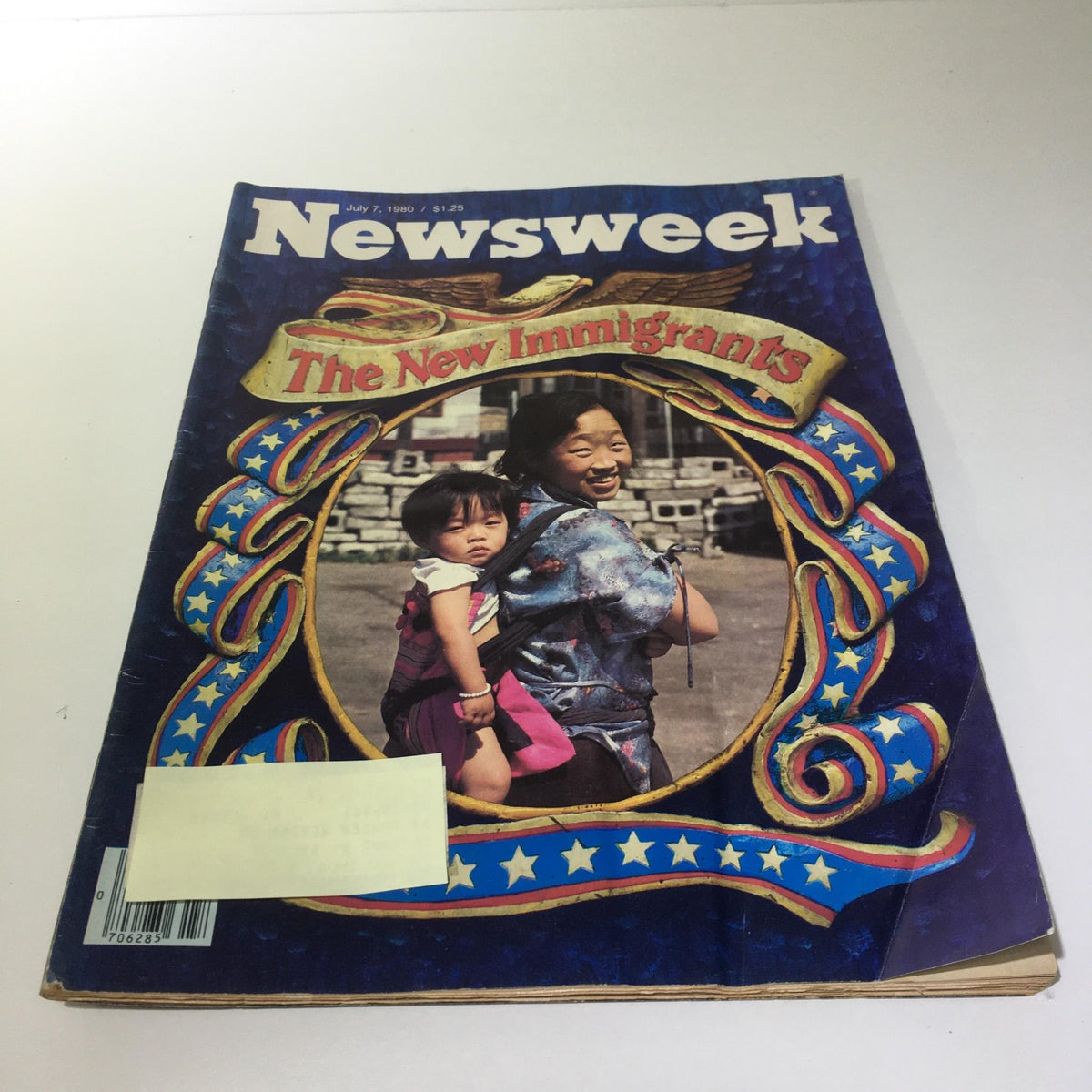 Cover of Newsweek Magazine dated July 7, 1980, titled 'The New Immigrants', showcasing a woman with a child in a cultural illustration relevant to immigration discussions.
