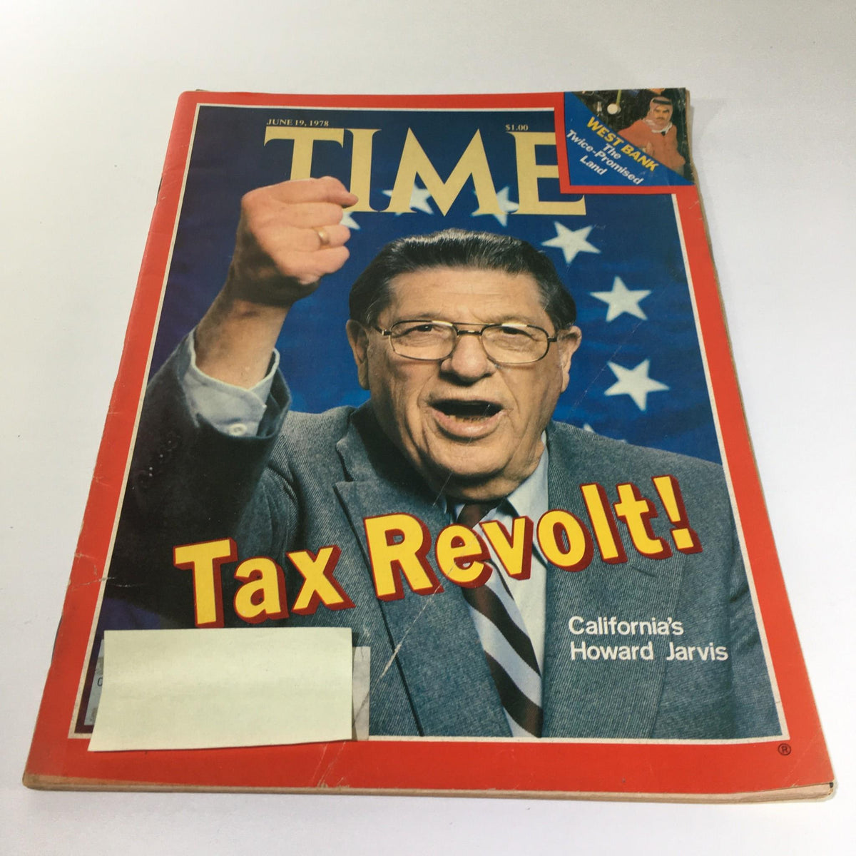 Cover of Time Magazine dated June 19, 1978 featuring California's Howard Jarvis and the headline 'Tax Revolt!'. The image shows Jarvis passionately raising his fist against a backdrop of stars, symbolizing activism and political change during the tax revolt movement.