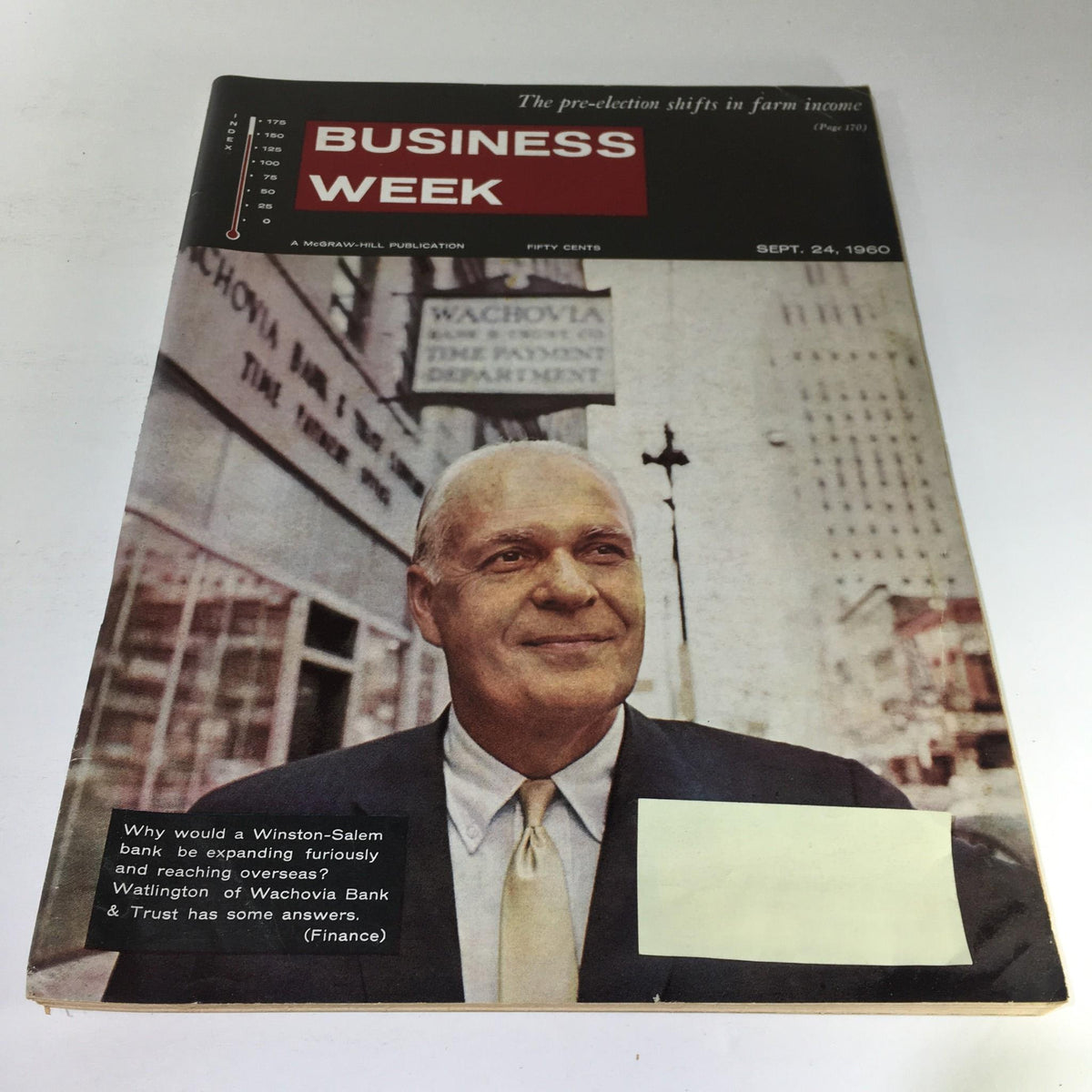 Cover of Business Week Magazine from September 24, 1960, featuring a smiling man against a backdrop of banking institutions. The headline discusses the expansion of Winston-Salem Bank and its reach into overseas markets.