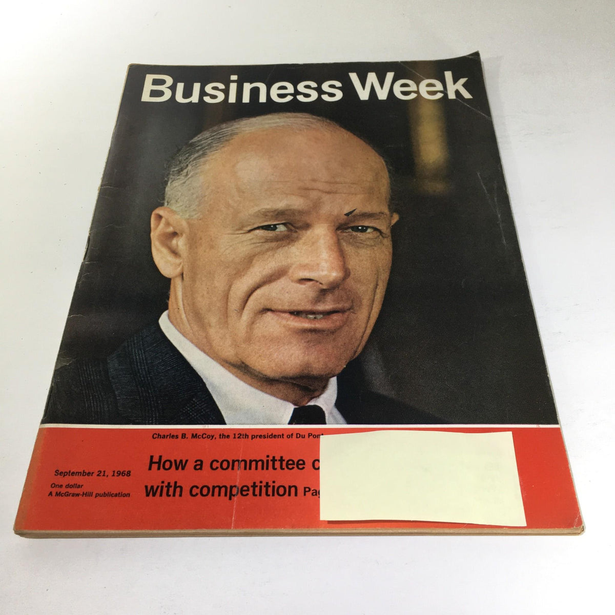 Cover of Business Week Magazine from September 21, 1968 featuring Charles B. McCoy, the 12th President of Du Pont, highlighting business insights from that era. The magazine displays notable wear, adding to its vintage appeal.