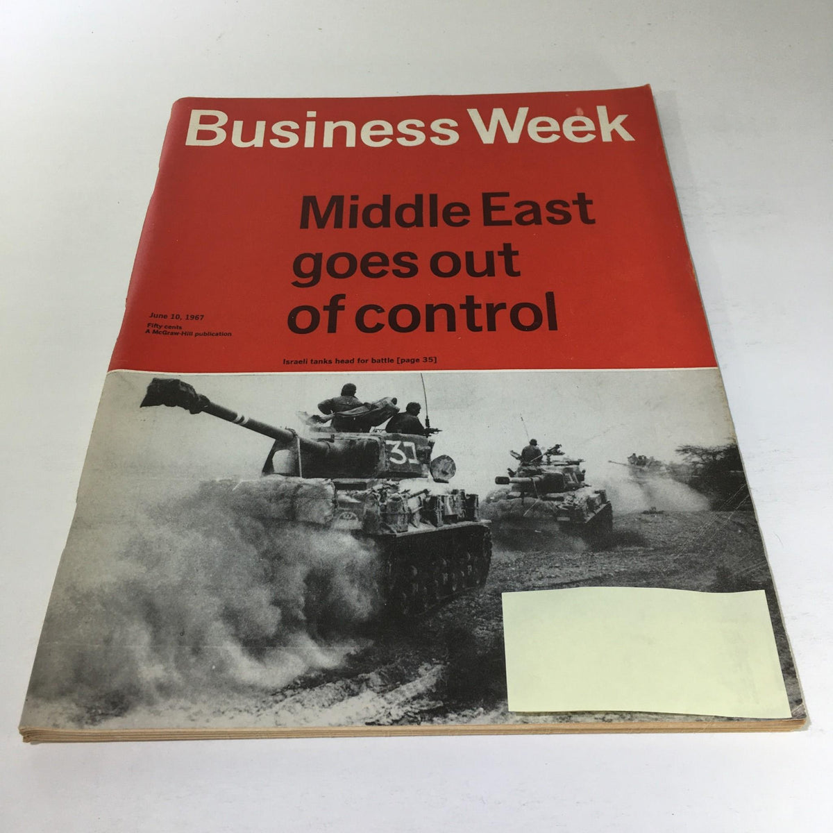 Cover of Business Week Magazine from June 10, 1967, featuring the headline 'Middle East Goes Out of Control' with a striking image of Israeli tanks heading into battle, representing significant geopolitical events of the time.