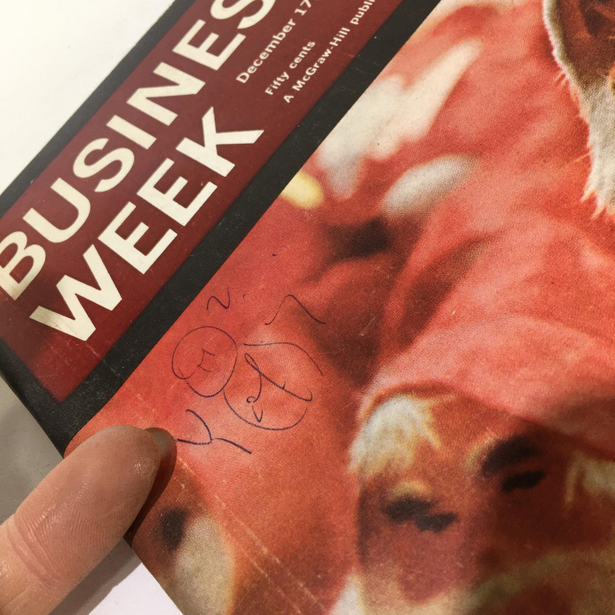 Upper section of the cover of Business Week Magazine, December 17, 1966, displaying handwritten markings and the iconic magazine title against a backdrop of festive Santa imagery.
