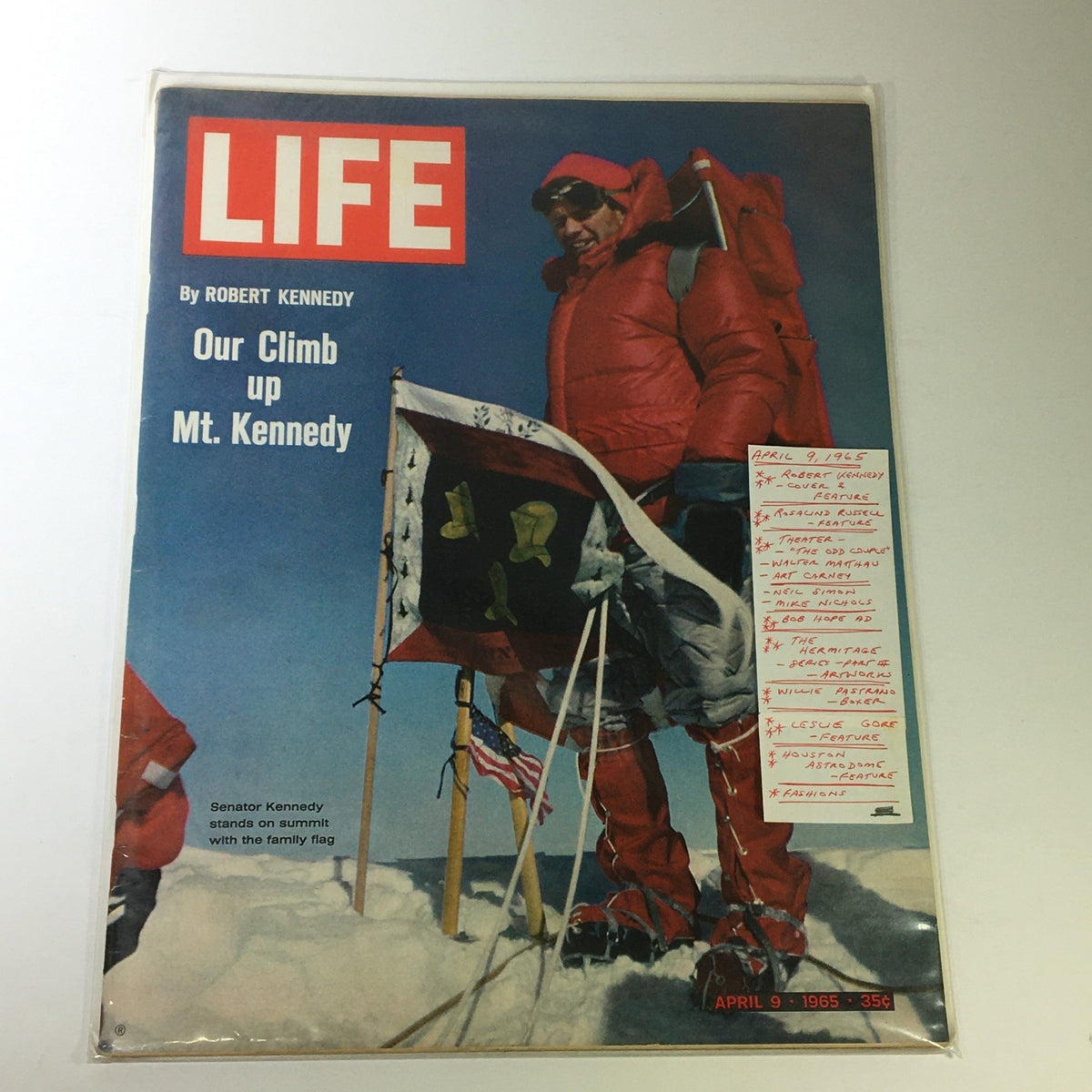 VTG Life Magazine cover from April 9, 1965 featuring Robert Kennedy's Climb up Mt. Kennedy, featuring annotations and showcasing Senator Kennedy in red winter attire on a snowy peak.