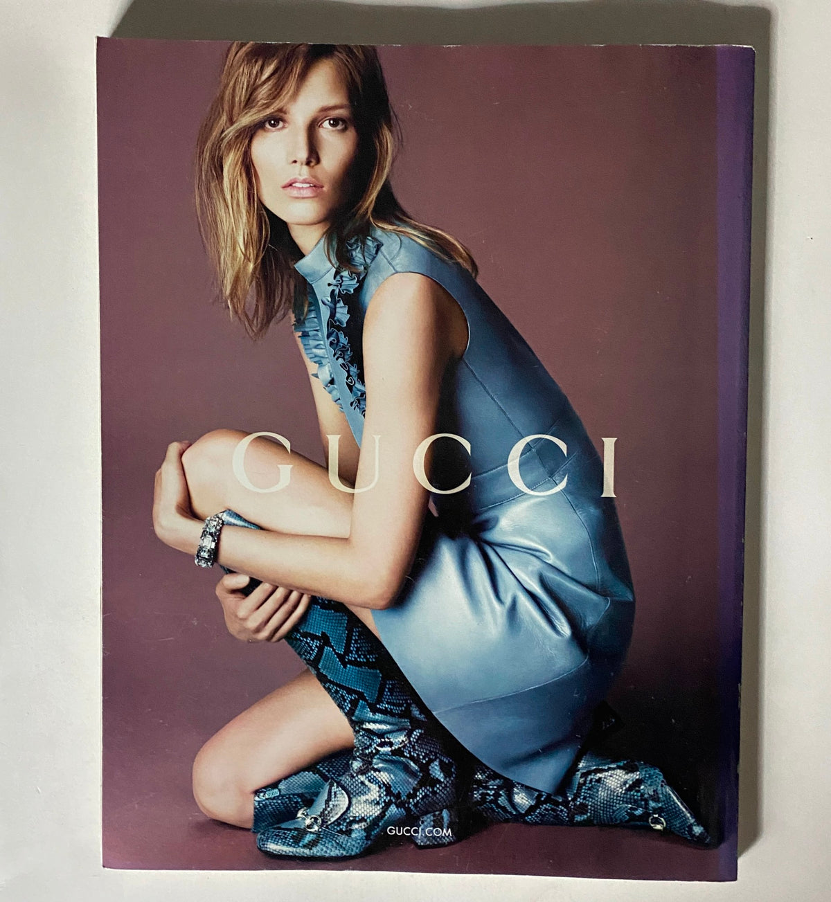 Cover of Vogue UK Magazine August 2014 featuring Victoria Beckham, with a description of its vintage condition and style. The magazine highlights fashion trends and includes features such as editor's letters and notes on contemporary styles.
