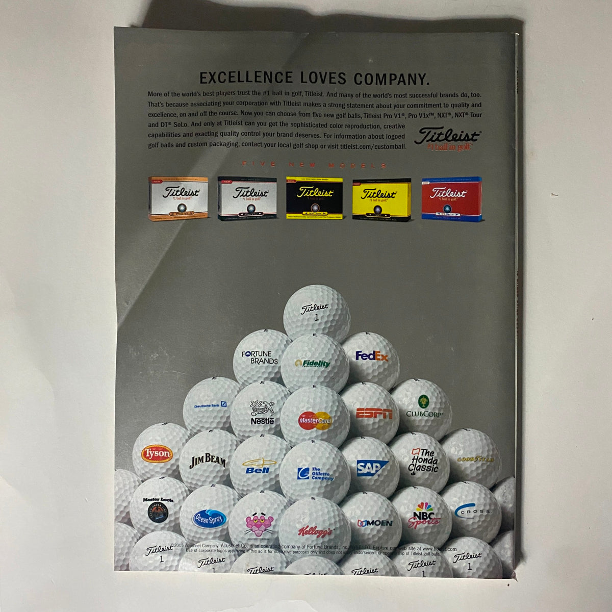 Back cover of Fortune Magazine June 13, 2005 displaying an advertisement for Titleist golf balls, showcasing various brand logos and promoting quality.