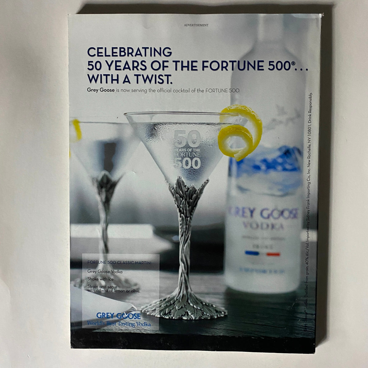 Back cover advertisement of Fortune Magazine celebrating 50 years of the Fortune 500, featuring Grey Goose vodka as the official cocktail.
