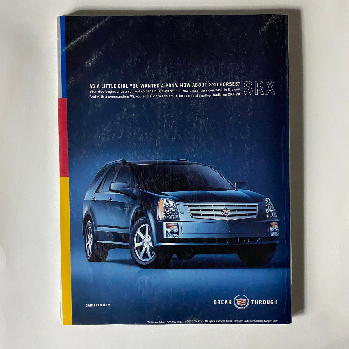 Vogue Magazine May 2005 Liya Kebede Cover Model with a Cause No Label VG showcasing an advertisement for the Cadillac SRX vehicle, emphasizing its performance and lifestyle appeal.