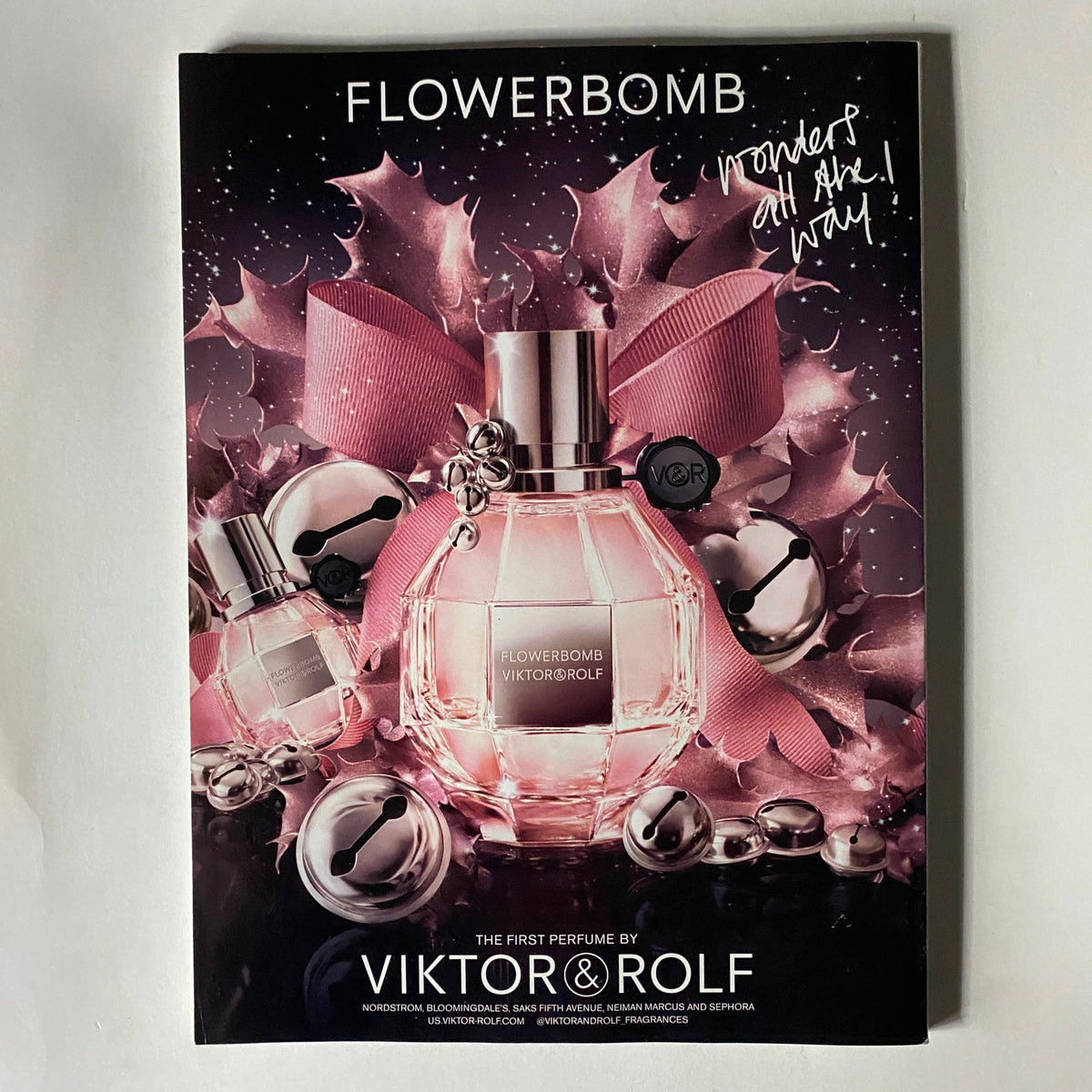 Advertisement for Flowerbomb by Viktor & Rolf in Vogue Magazine November 2018, showcasing the fragrance in a stylish presentation.
