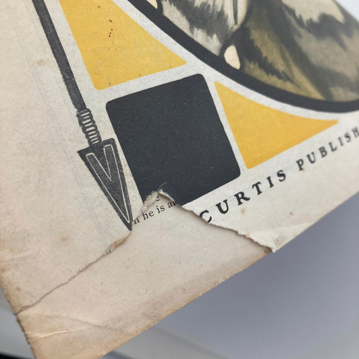 Close-up of the cover of The Saturday Evening Post from March 29, 1902, highlighting damage on the edge and detailing the publication.