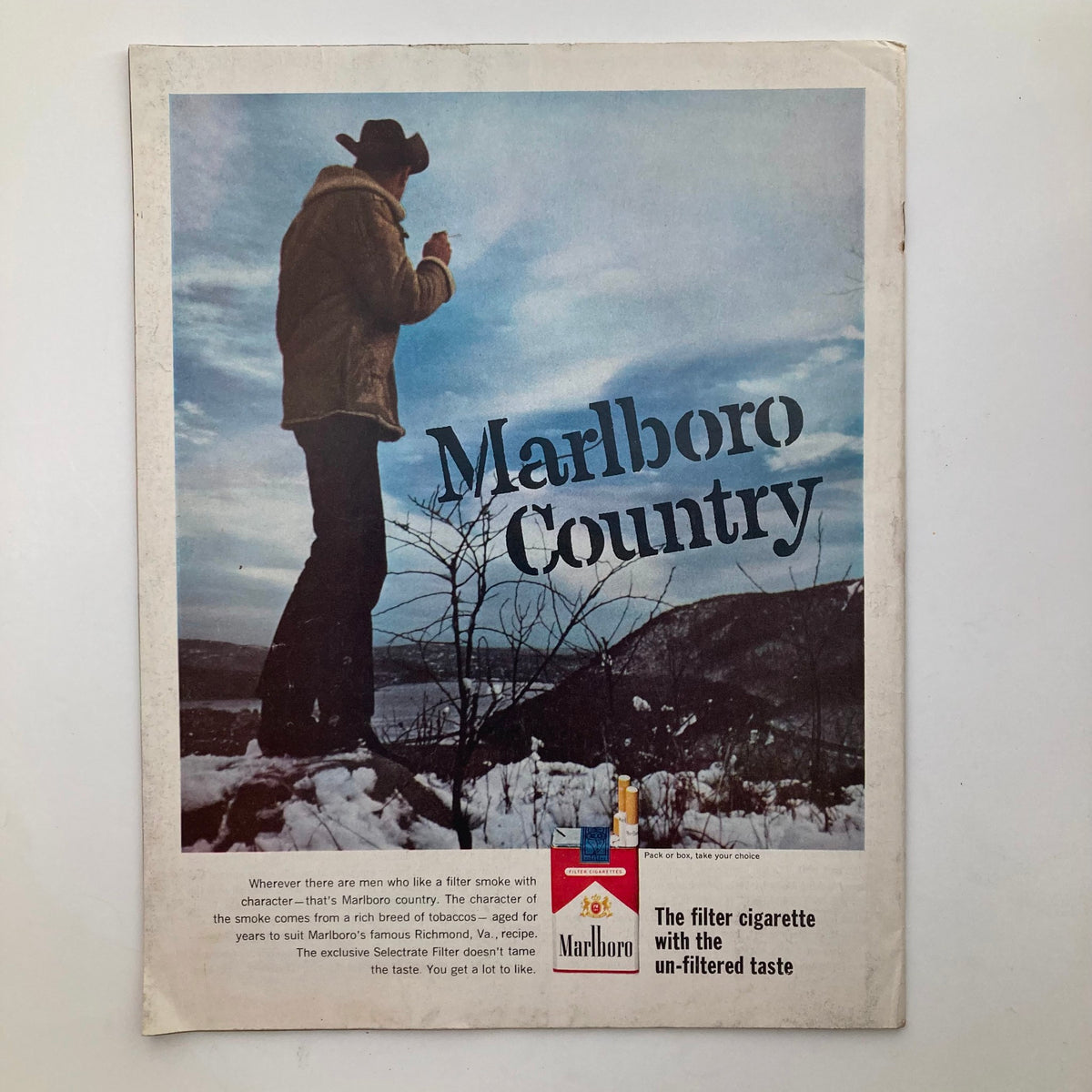 Cover of The Saturday Evening Post February 2, 1963, Volume 236, Number 4 featuring an advertisement for Marlboro cigarettes, showcasing a man standing in a mountainous landscape with the headline 'Marlboro Country'.