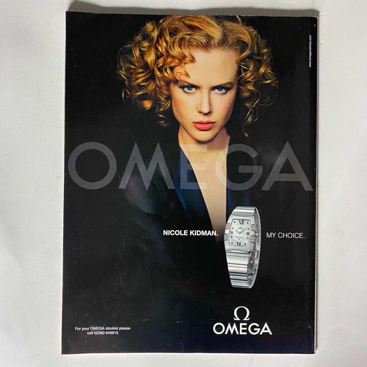 Vintage advertisement featuring Nicole Kidman for Omega watches, showcasing the slogan 'My Choice', in relation to the Harpers Abroad Magazine November 2005 issue highlighting the 100 Best Places in the World.