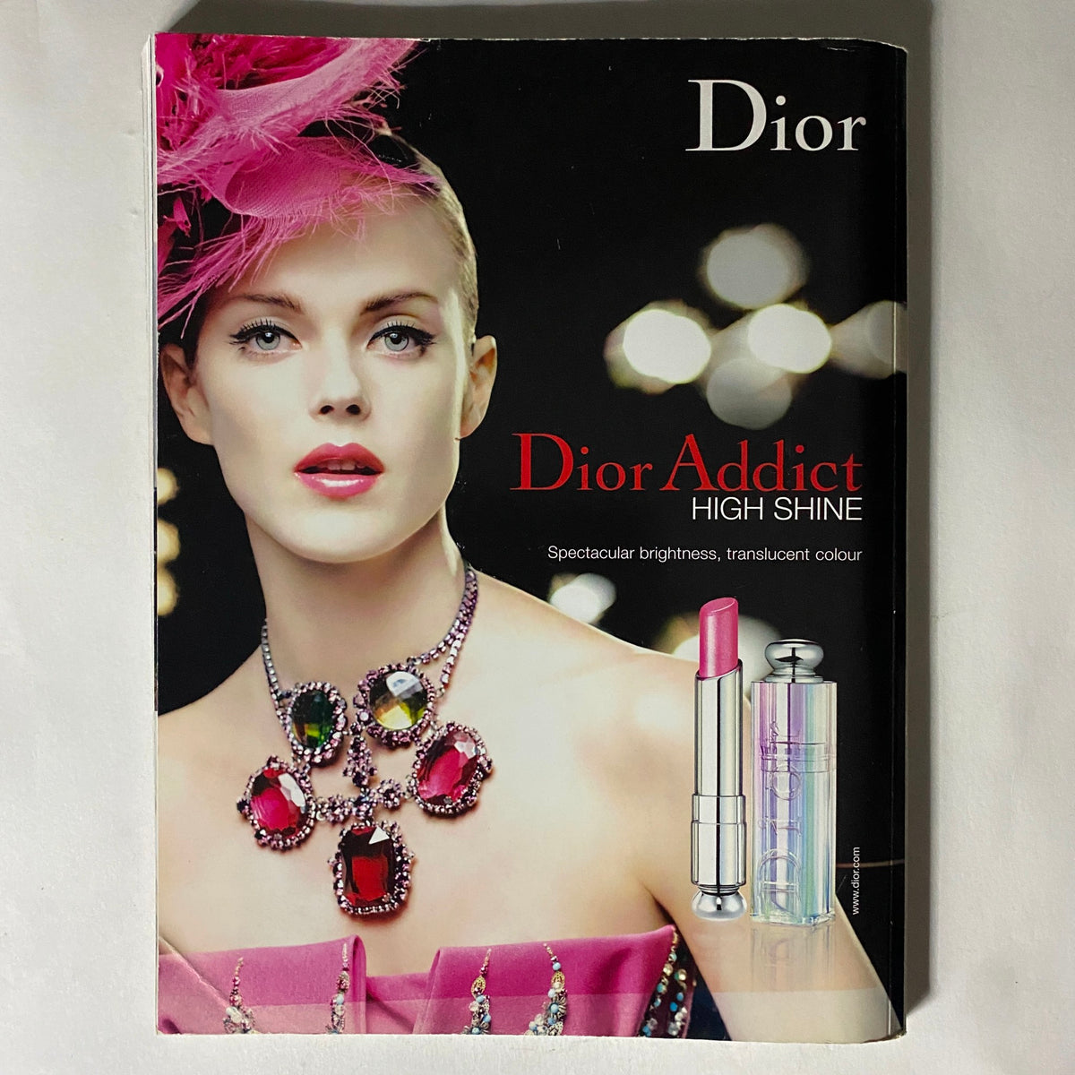 Dior Addict High Shine advertisement from Harper's Bazaar Australia June 2008 featuring a woman with striking makeup and jewelry.