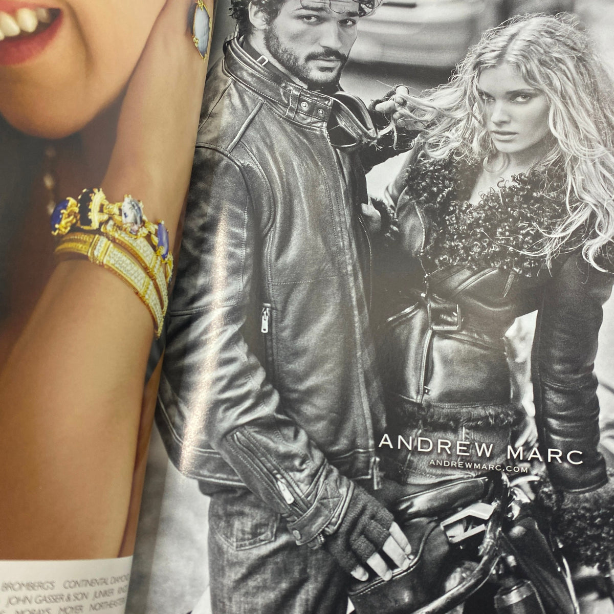 A black and white advertisement from Vogue Magazine September 2009 featuring a stylish couple in Andrew Marc apparel, showcasing high-fashion looks.