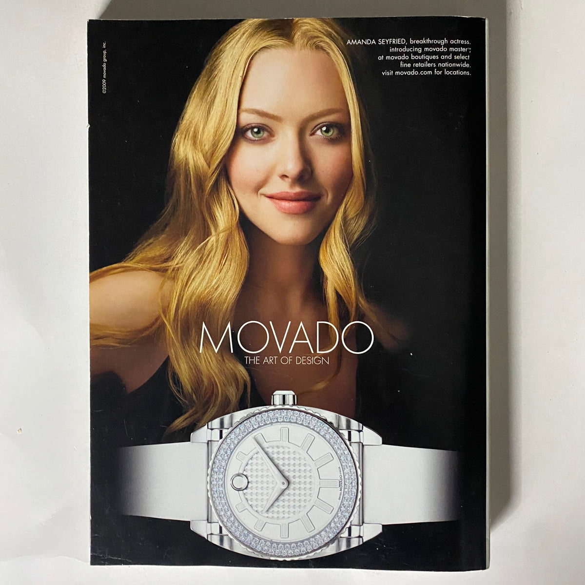 Back cover of Vogue Magazine September 2009 featuring Amanda Seyfried for Movado, highlighting the watch design and brand aesthetics.