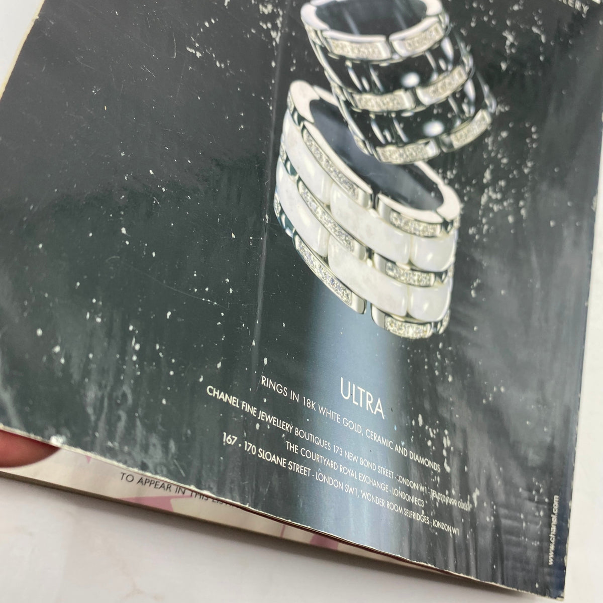 Advertisement in Vogue UK Magazine April 2008 featuring Chanel Fine Jewellery rings in 18K white gold, ceramic, and diamonds.