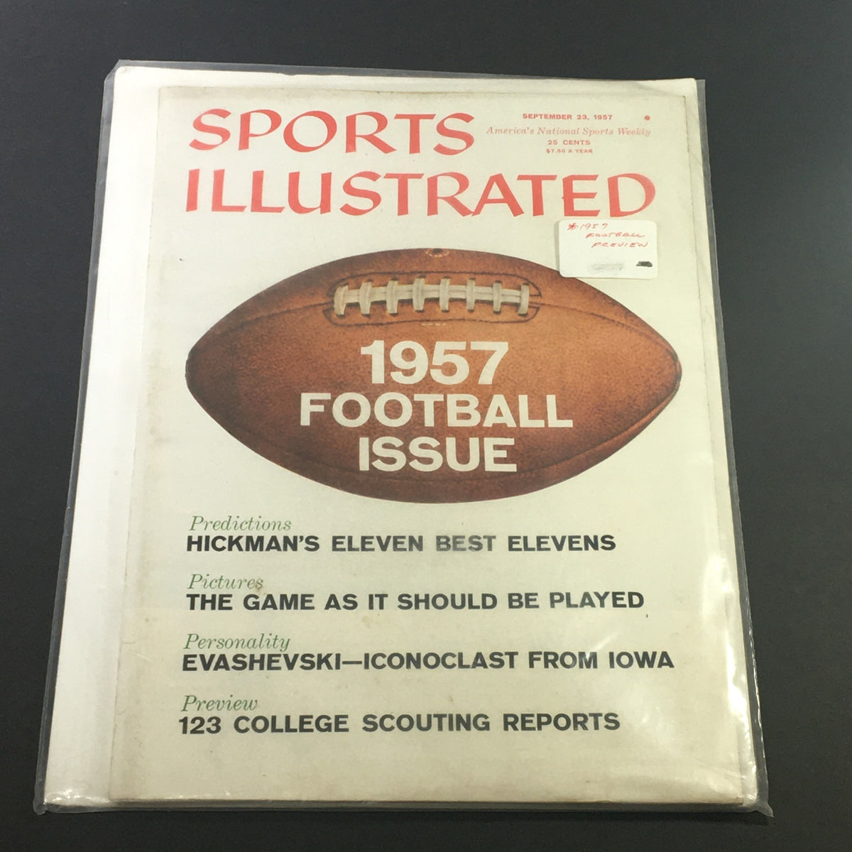 Sports Illustrated Magazine September 23 1957 Football Issue, protected in plastic with visible cover details including predictions and features.