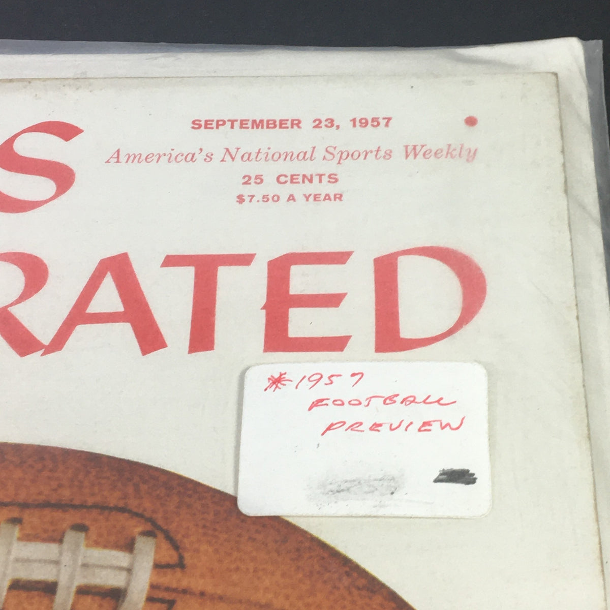 Close-up of Sports Illustrated Magazine September 23 1957 Football Issue cover showing title and handwritten label about the football preview.