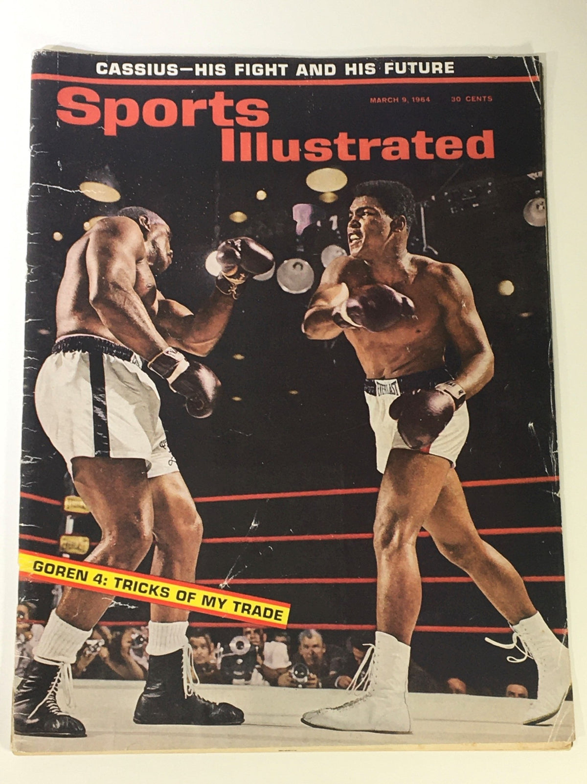 Cover of Sports Illustrated Magazine March 9 1954 featuring Muhammad Ali and Cassius Clay in a boxing match, highlighting a significant moment in sports history.