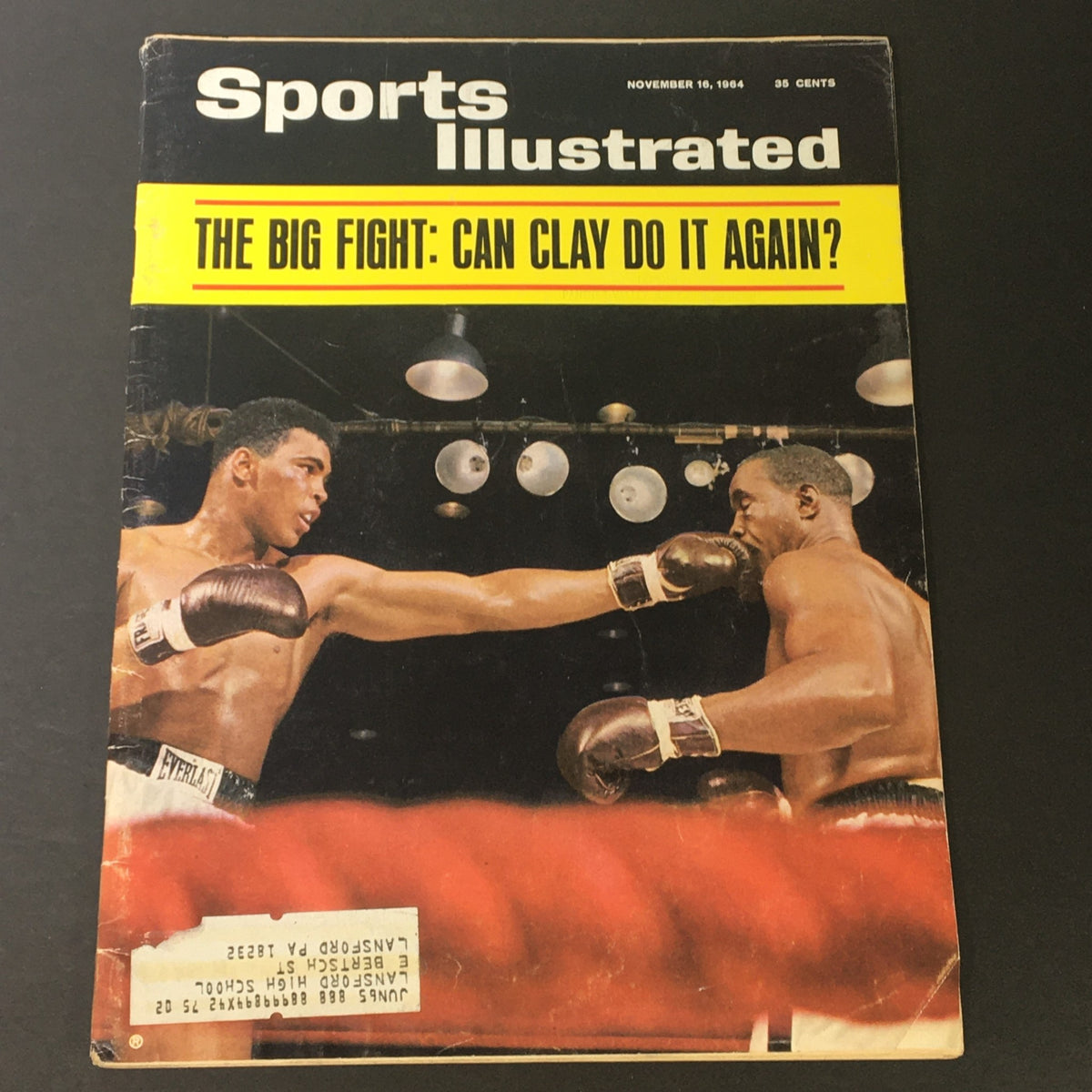 VTG Sports Illustrated Magazine November 16, 1964 featuring a cover image of the boxing match between Sonny Liston and Cassius Clay, showcasing the intense rivalry in a dynamic action pose.