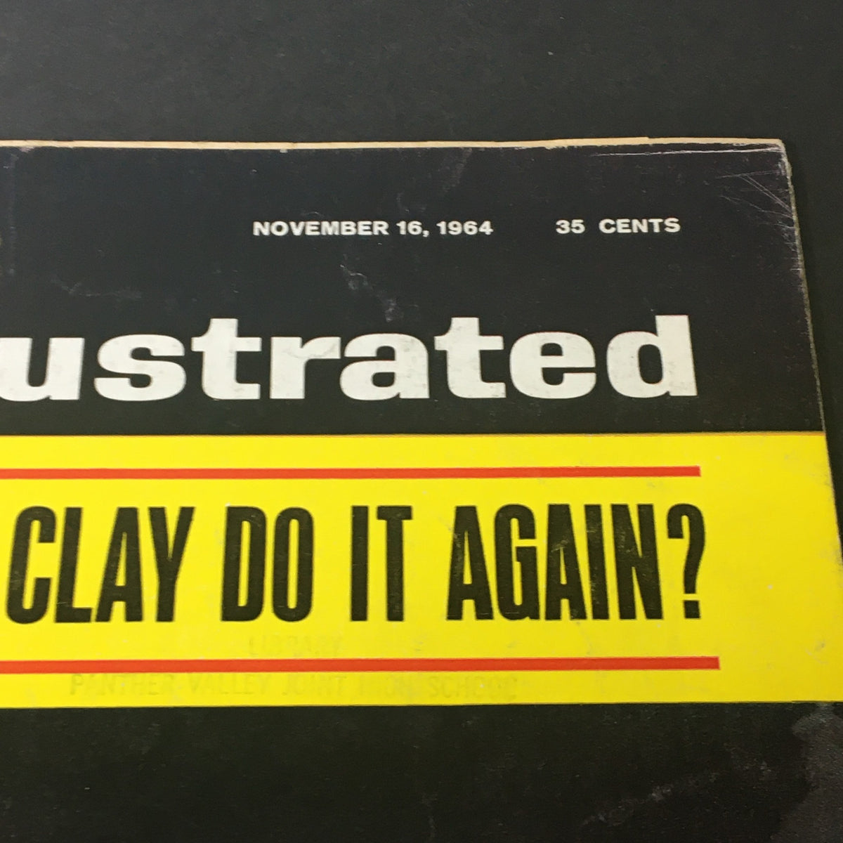 Close-up of the cover of the VTG Sports Illustrated Magazine November 16, 1964, highlighting the title question, 'CAN CLAY DO IT AGAIN?' alongside the publication date and price.