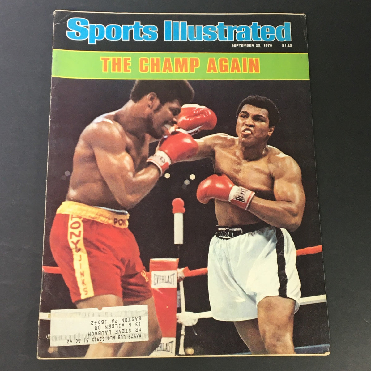 Vintage Sports Illustrated Magazine September 25, 1978 cover featuring Muhammad Ali and Leon Spinks boxing, showcasing the iconic fight that marked a pivotal moment in sports history.