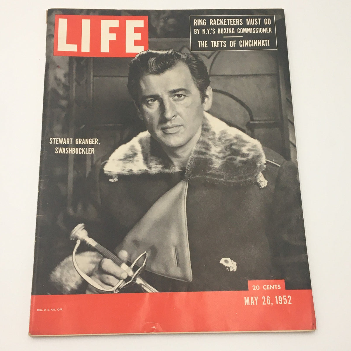VTG Life Magazine May 26 1952 featuring Stewart Granger on the cover, showcasing his role as a swashbuckler, and reflecting mid-20th century Hollywood glamour.