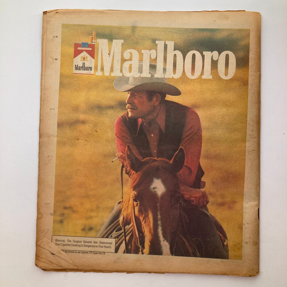 Advertising page from VTG Rolling Stone Magazine, July 10, 1980, issue No. 321, displaying a Marlboro advertisement featuring a cowboy on horseback, reflecting the magazine's style and popular culture themes of the time.